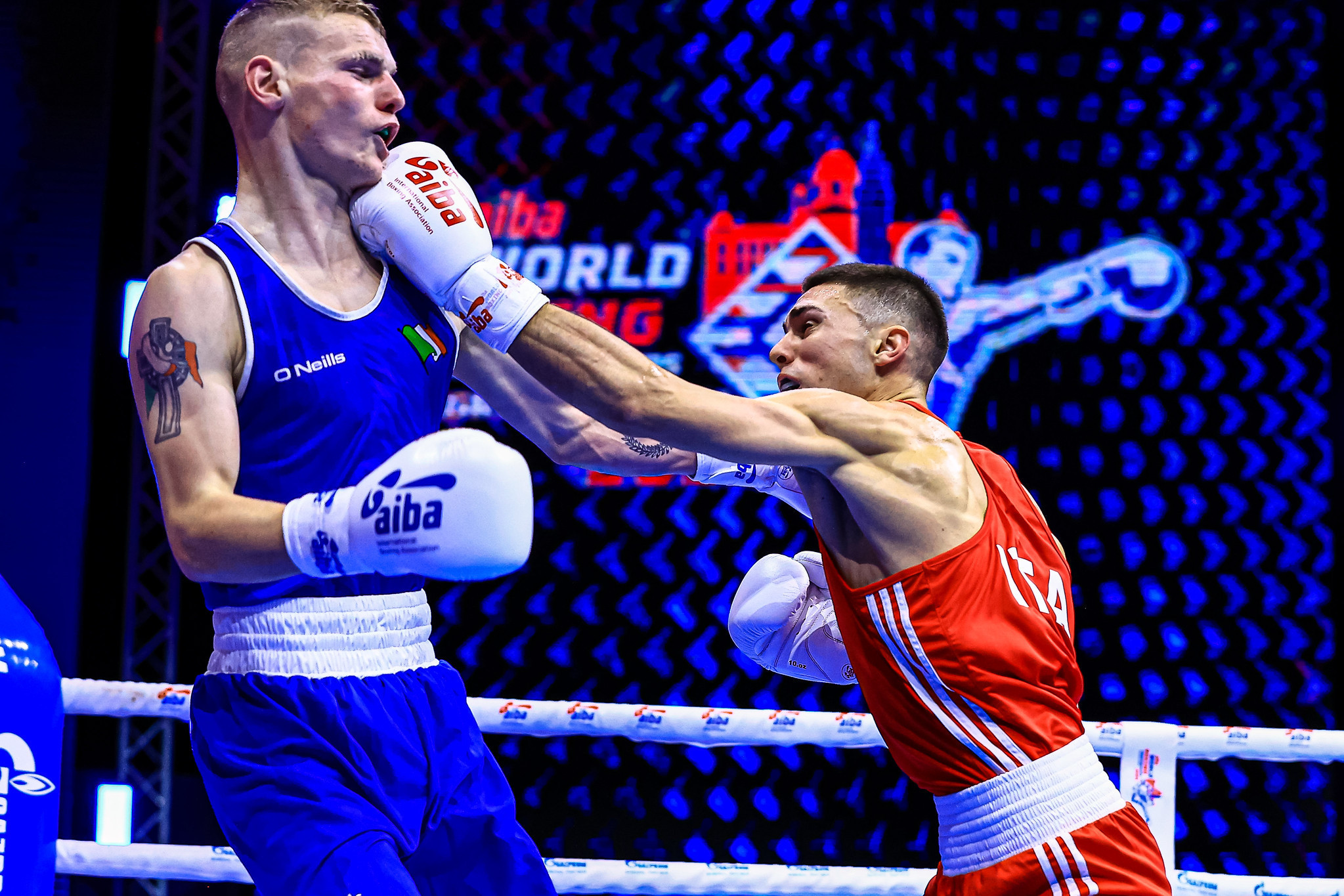 Gianluigi Malanga of Italy landing a punch on Irish boxer Brandon McCarthy ©AIBA