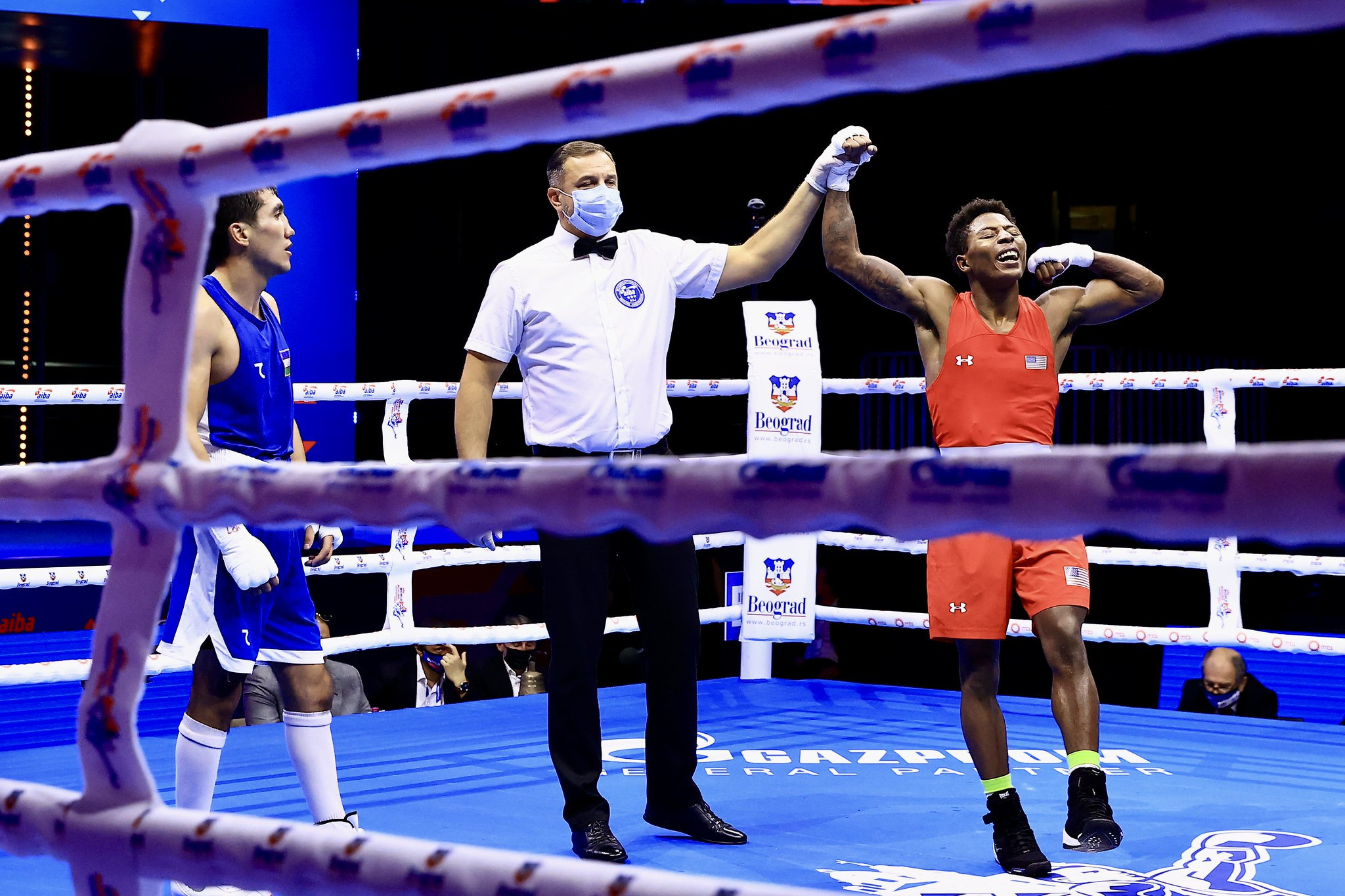 Mirazizbek Mirzakhalilov, blue, was knocked out of the World Championships today at the round of 32 ©AIBA