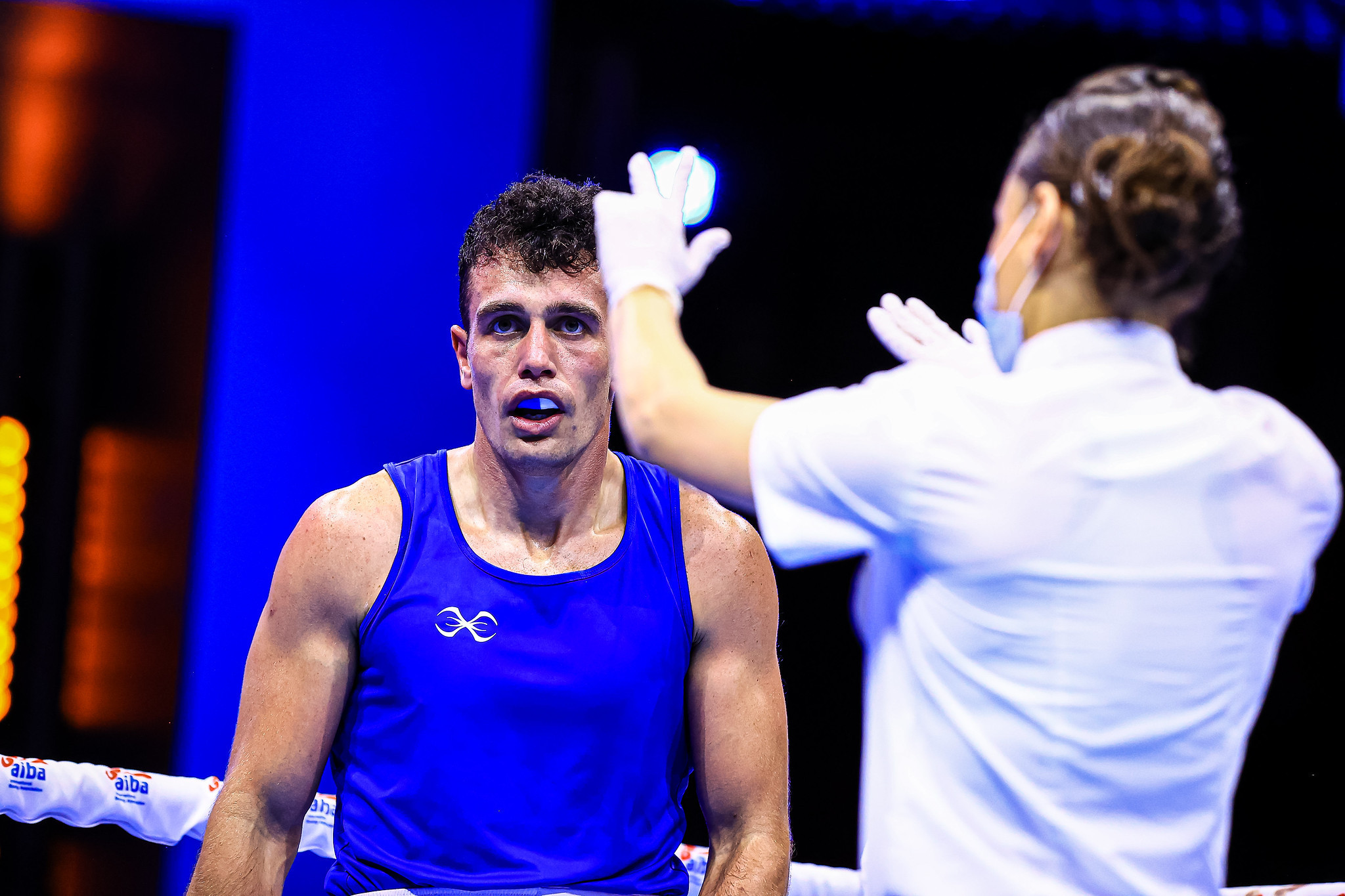 England's George Crotty's bout against Kyrgyzstan's Omurbek Bekzhigit turned against him when he was knocked down ©AIBA
