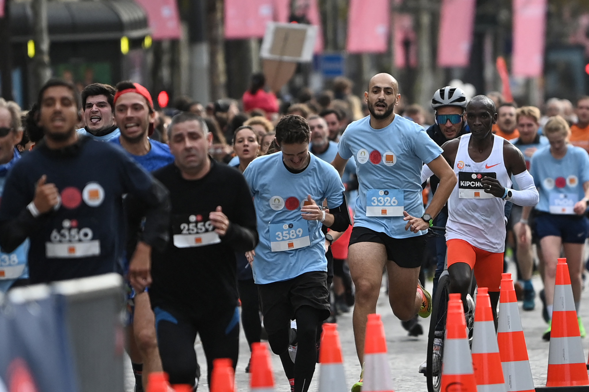 Runners win Paris 2024 massparticipation marathon places after racing Kipchoge