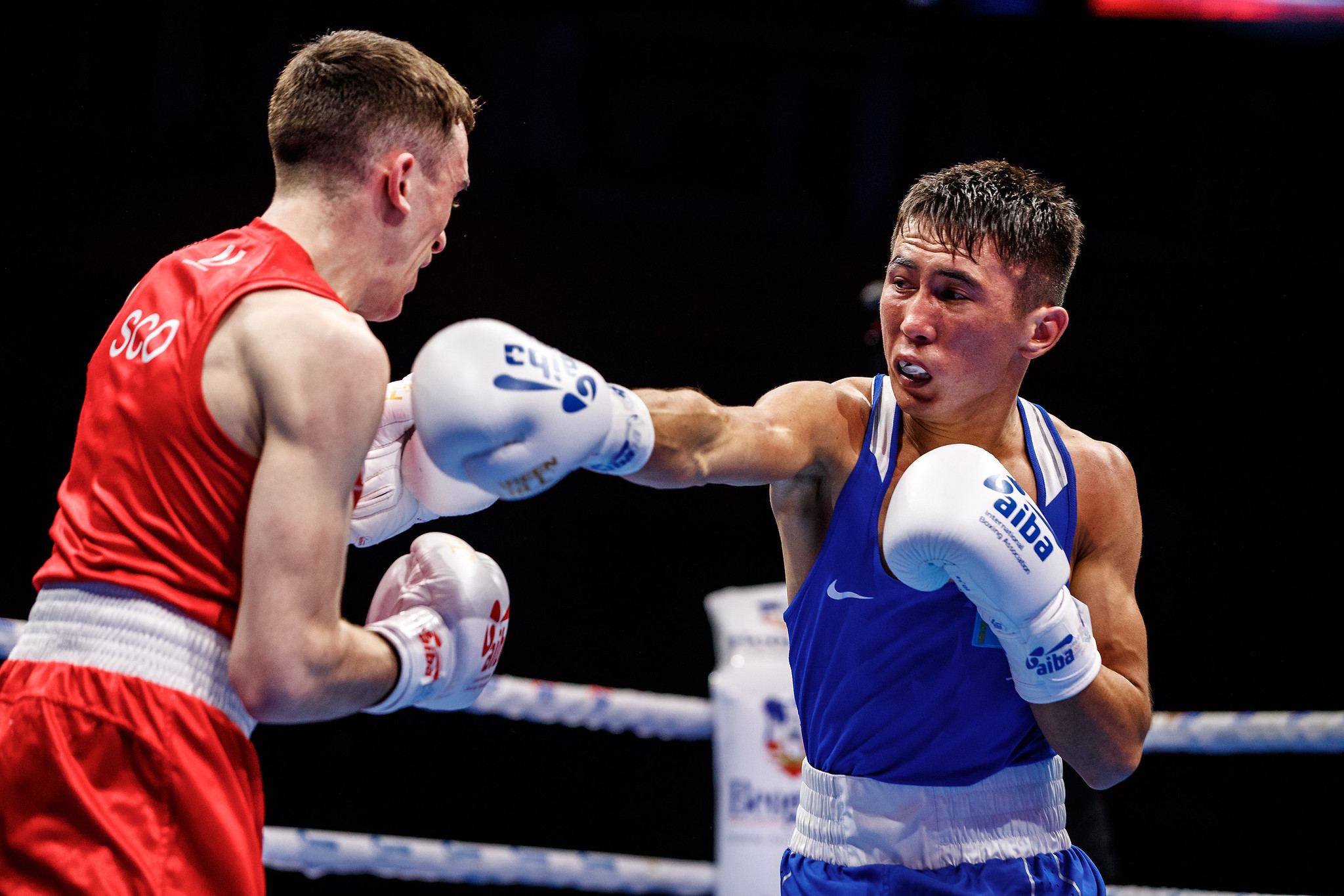 Kazakhstan's Makhmud Sabyrkhan is through in the under-54kg following victory over Scotland's Matty McHale ©AIBA