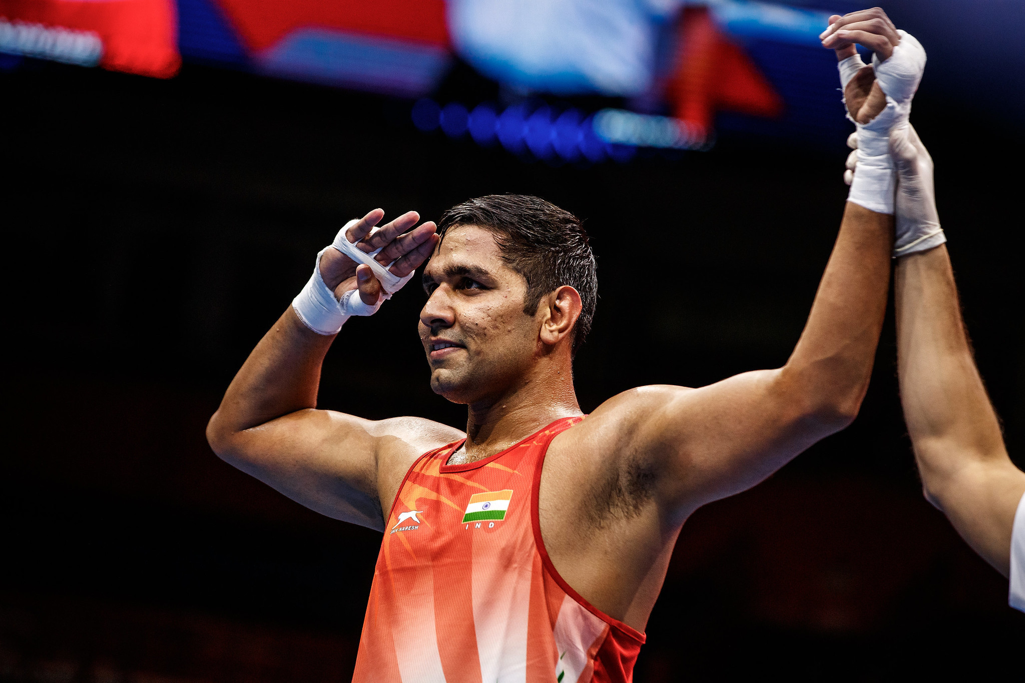 India's Narender gave his traditional salute celebration after another victory in the over-92kg division ©AIBA