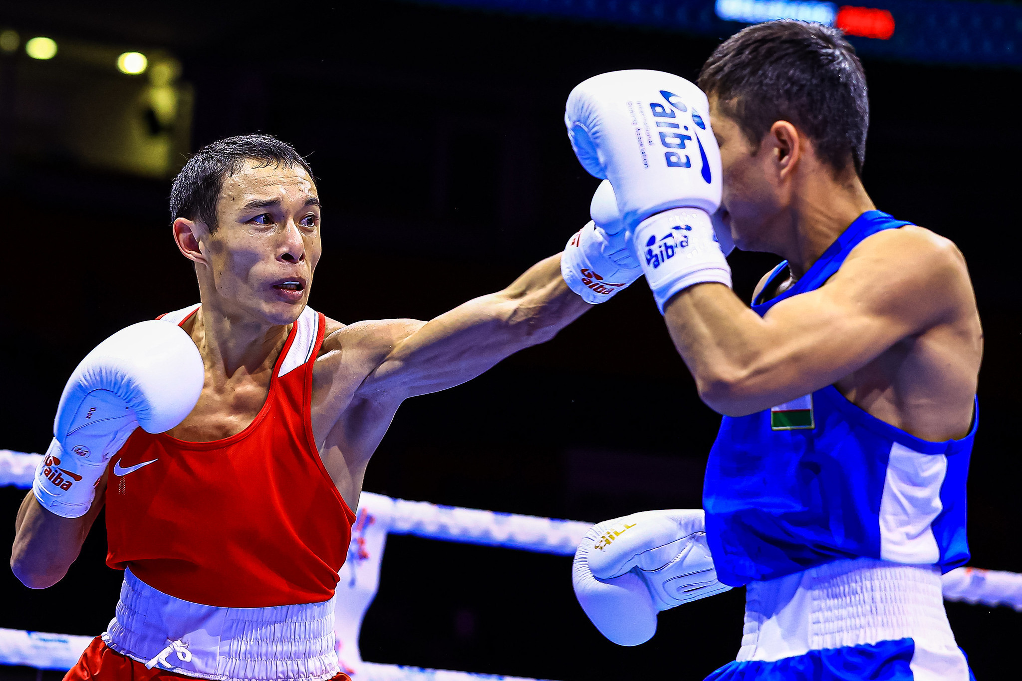 Kazakhstan's Temirtas Zhussupov defeated Nodirjon Mirzakhmedov of Uzbekistan in under-48kg ©AIBA