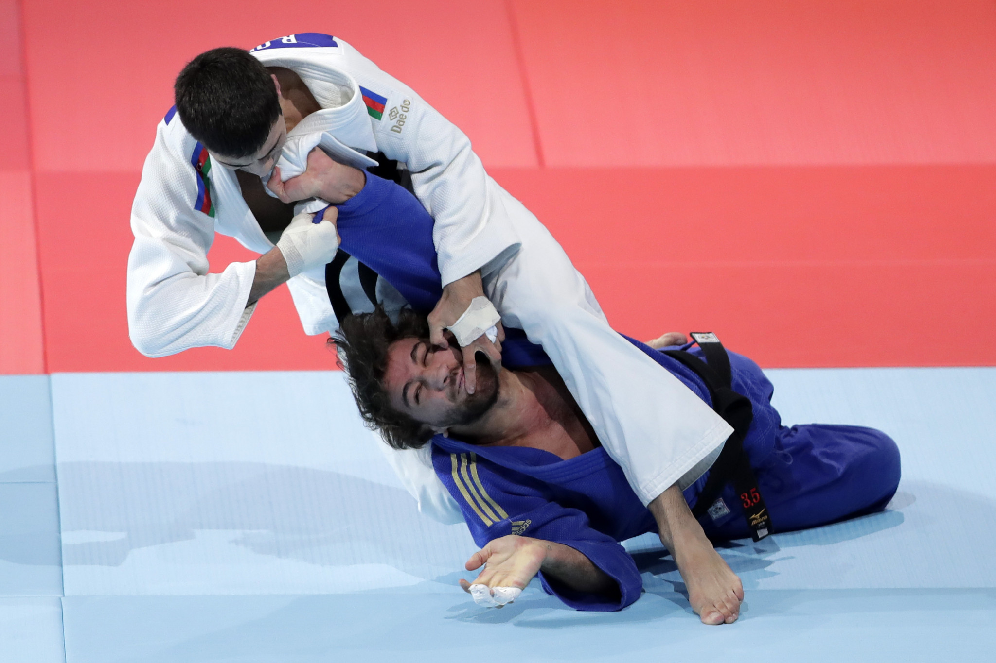 Rustam Orujov, in white, and Hidayet Heydarov could meet in the men's under-73kg final at the Baku Grand Slam ©Getty Images