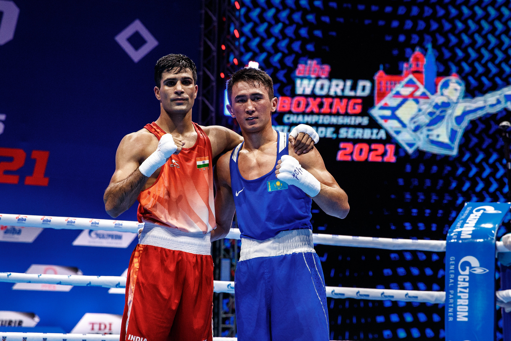 Akash Kumar, left, and Makhmud Sabyrkhan, right, show a sign of respect after their bout ©AIBA