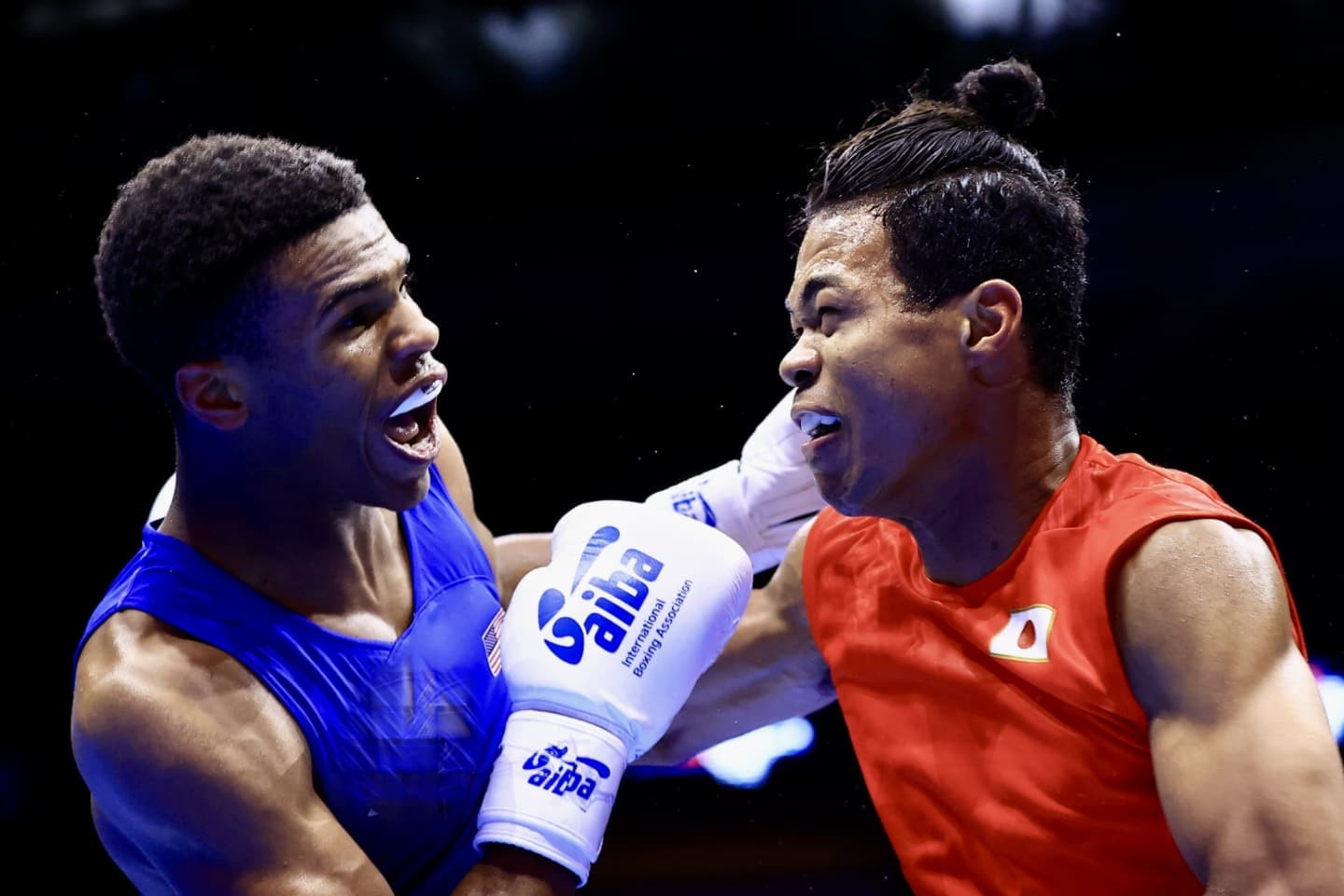 Omari Jones came close to the win against Sewon Okazawa ©AIBA