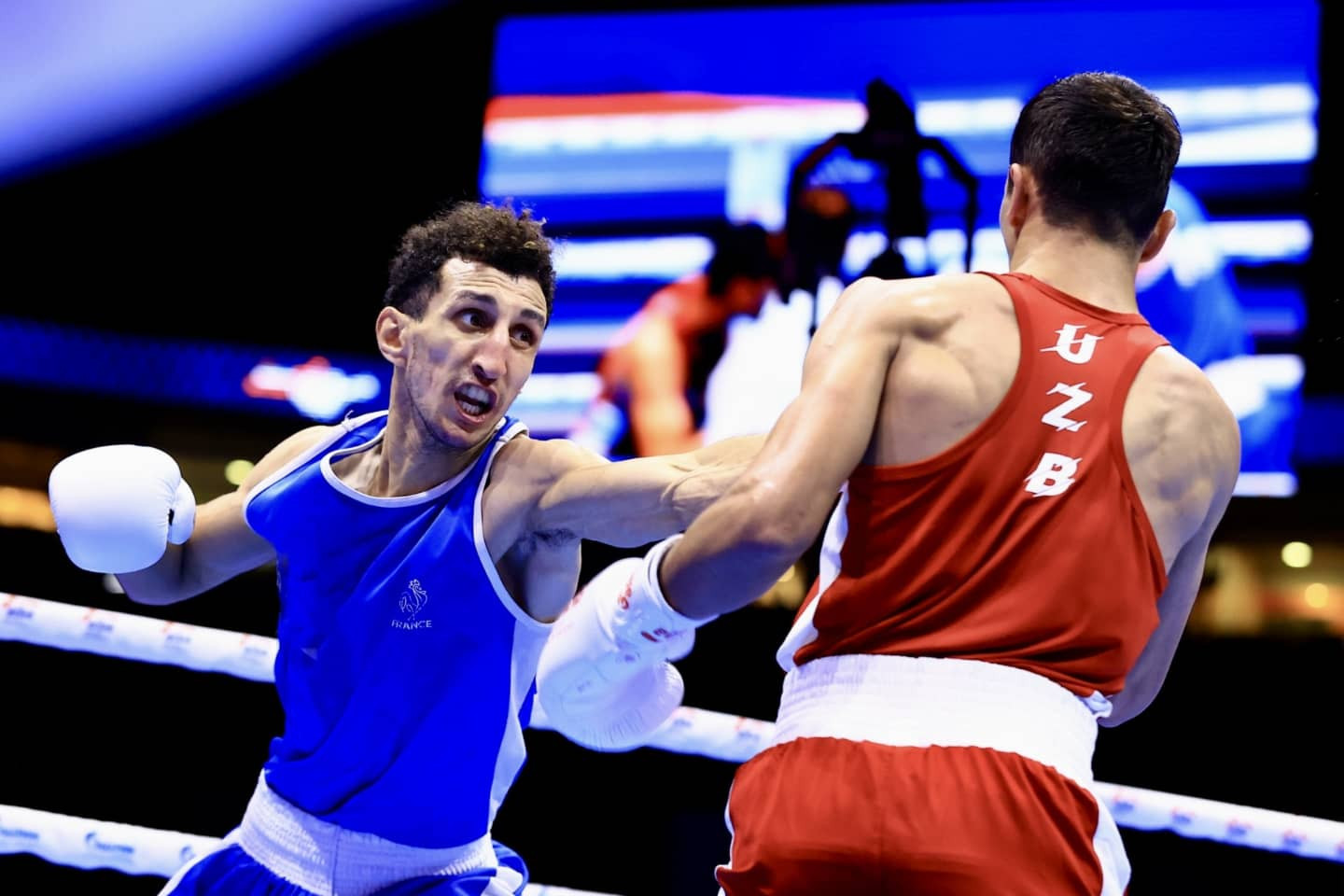 Sofiane Oumiha of France claimed victory against Uzbekistan's Abdumalik Khalokov ©AIBA