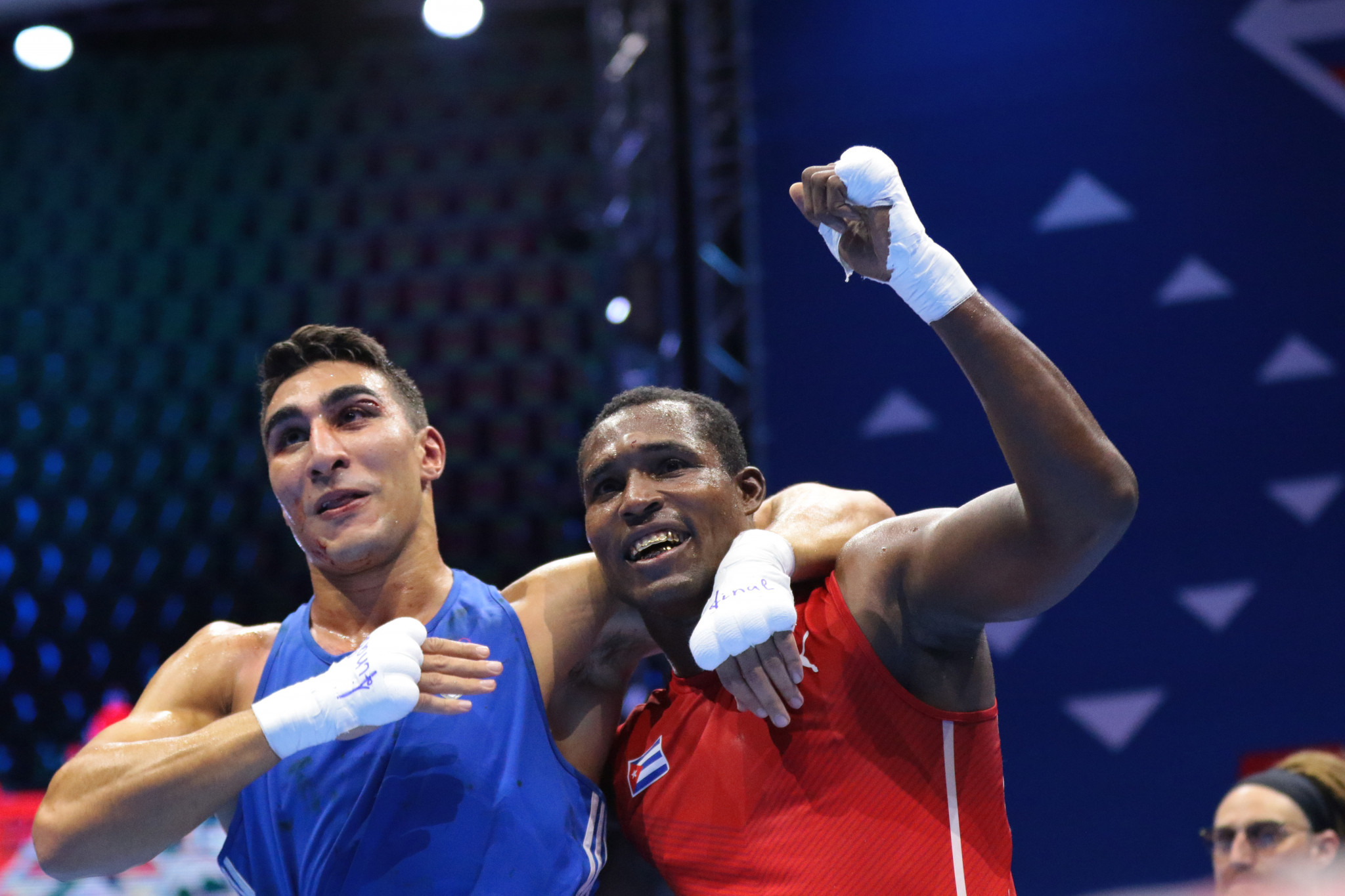 Aziz Abbes Mouhiidine of Italy, left, and Julio La Cruz of Cuba, right, showing a sign of respect after their bout ©Dimitrije Vasiljević 2021