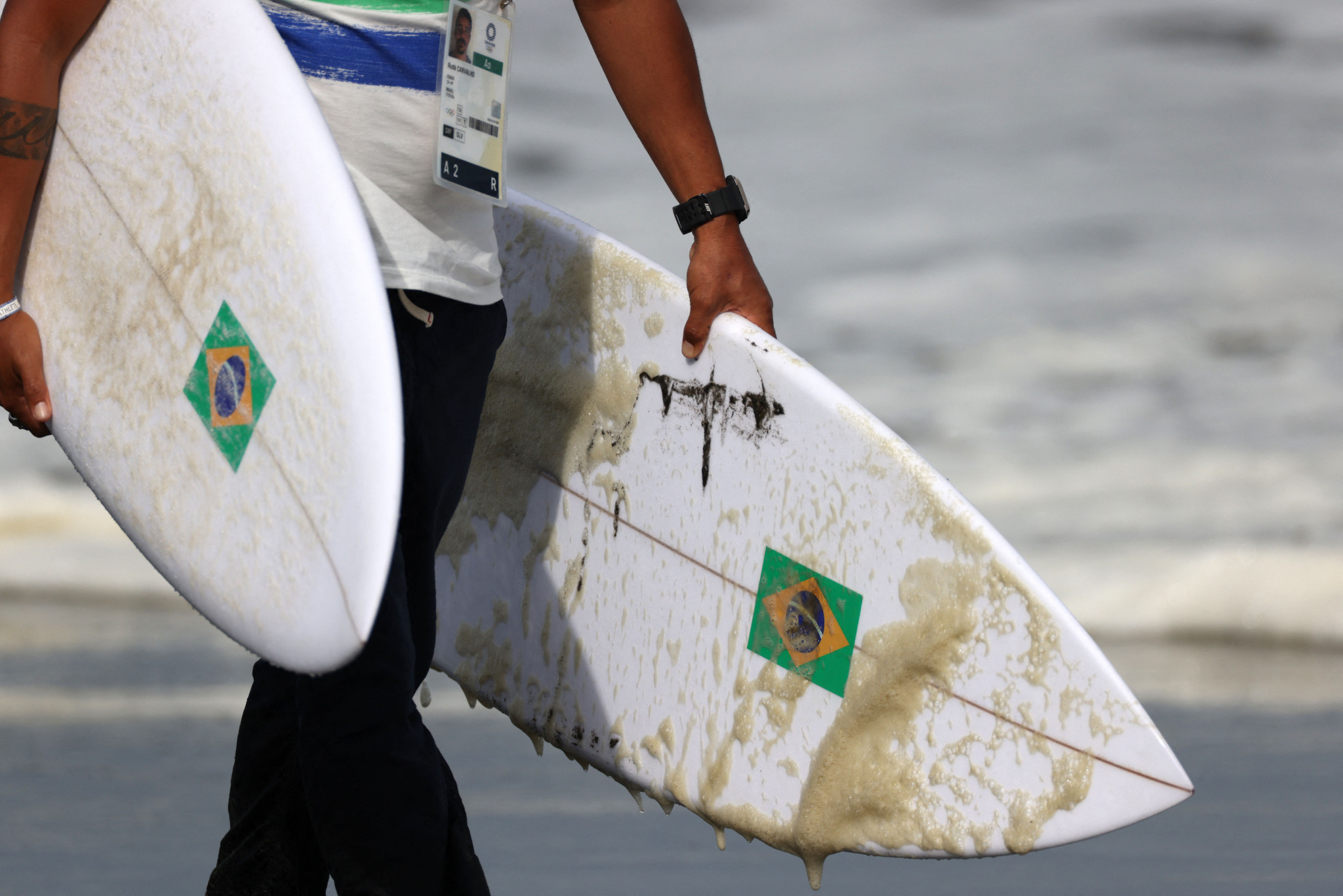 Italo Ferreira's broken surfboard from the Tokyo 2020 Olympics is among the items on display ©Getty Images