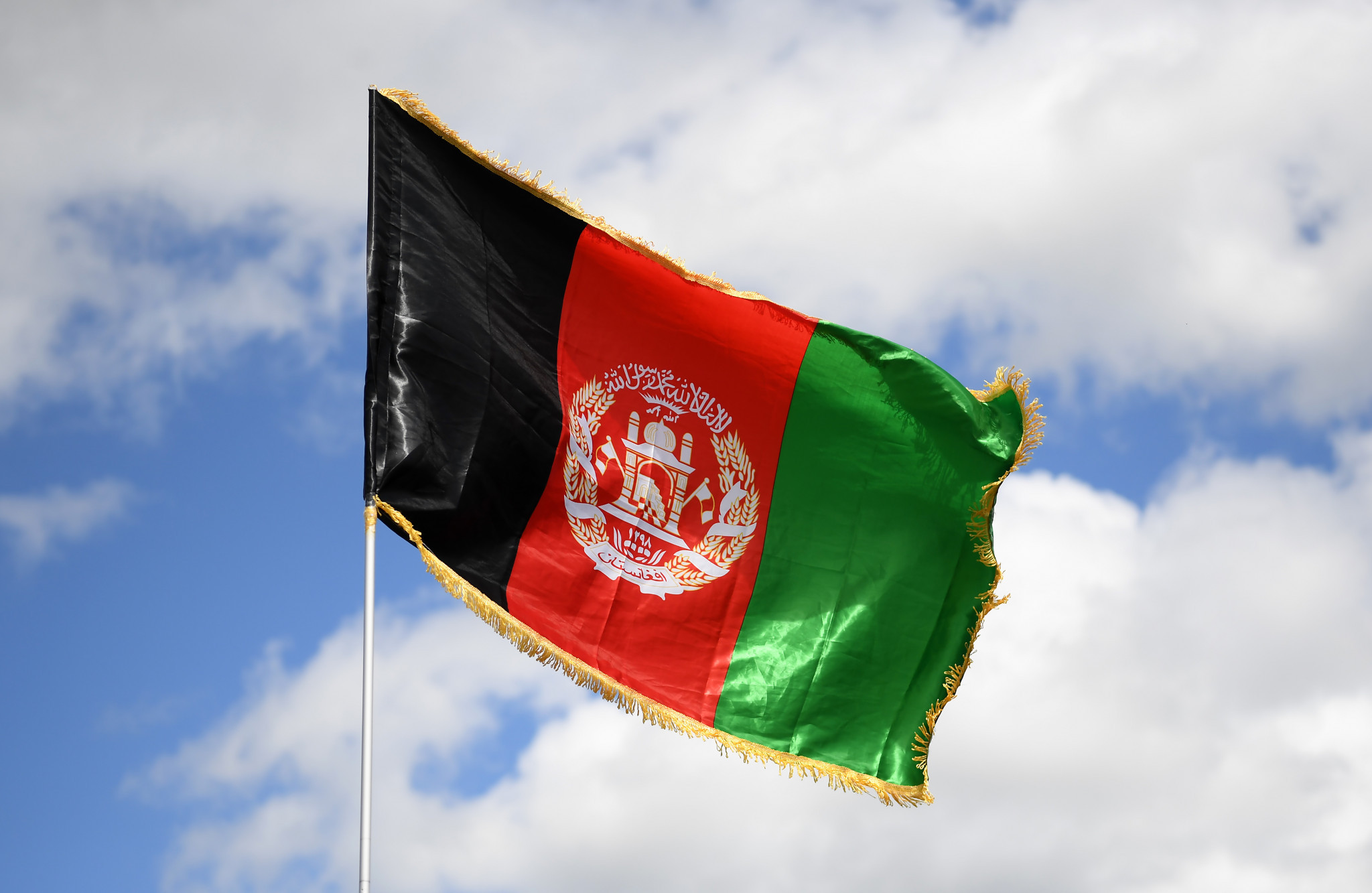Afghanistan's men's team performed well at the Pakistan Open, under the country's tricolour flag ©Getty Images
