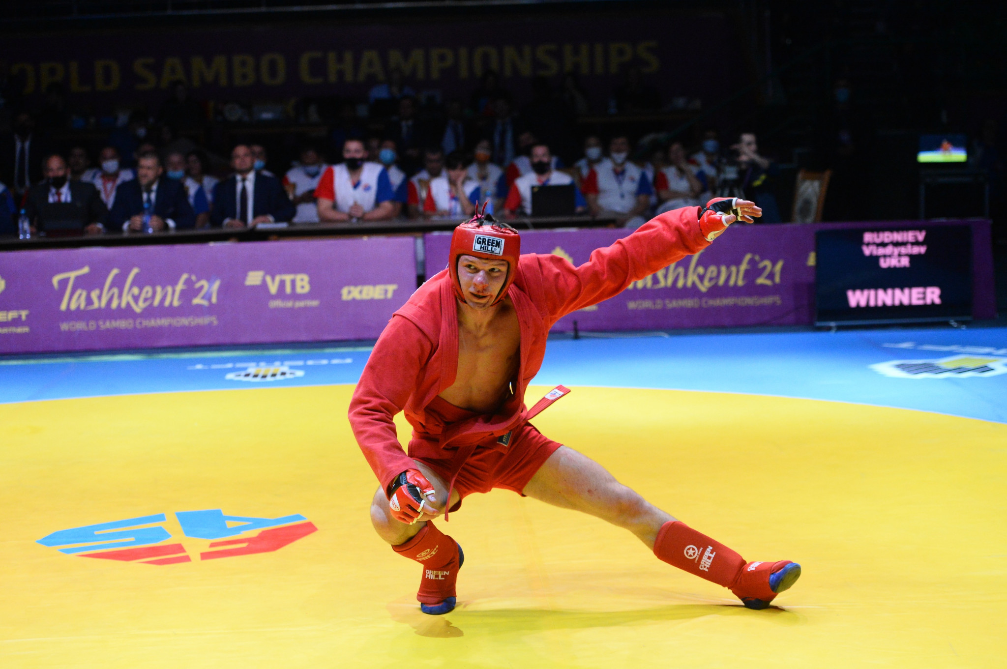 Vladyslav Rudniev dances with joy after beating Furket Ruziev to win combat under-79kg gold ©FIAS