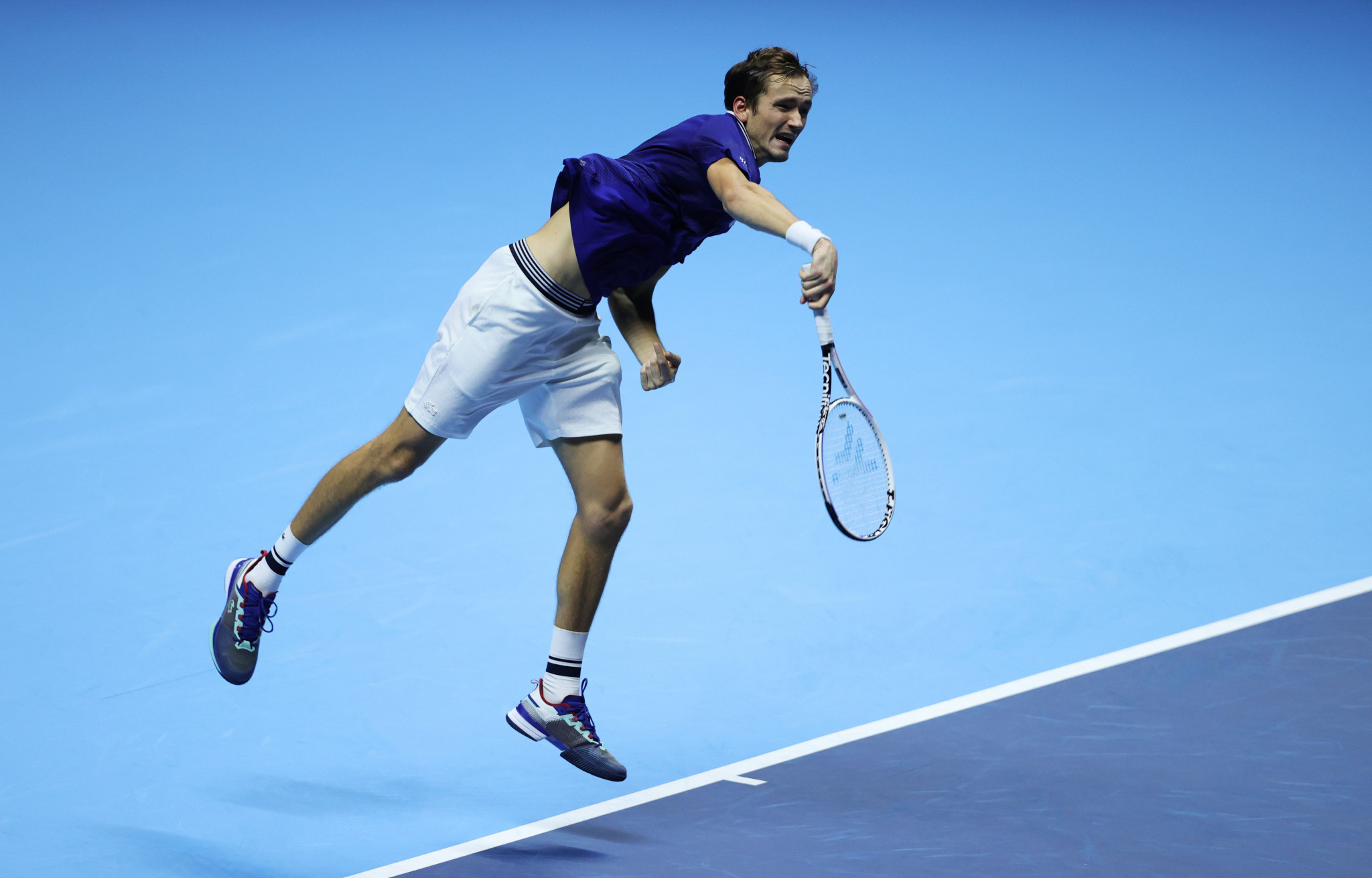 Defending champion Medvedev battles to three-set win on opening day of ATP Finals