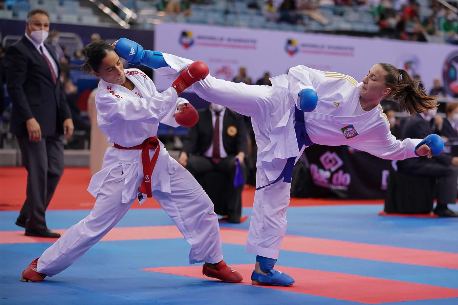 Olympic silver medallist Irina Zaretska, right, is on course to retain her women's under-68 kilograms kumite title ©WKF 