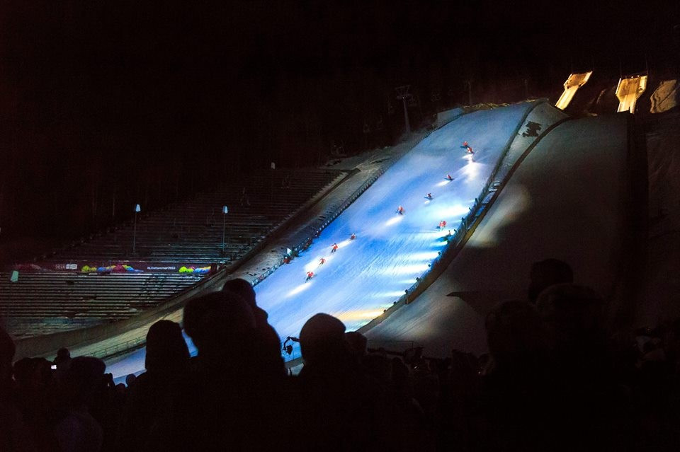 A host of skiers slalomed down the famous ski jumping course ©YIS/IOC