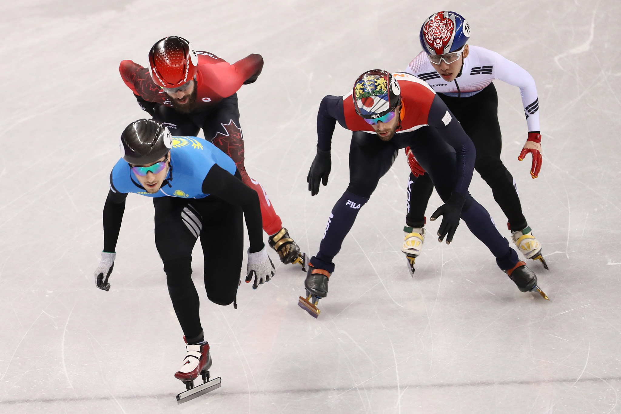 Denis Nikisha, front, leads the pack in the men's 500m overall standings after two third-place finishes ©Getty Images