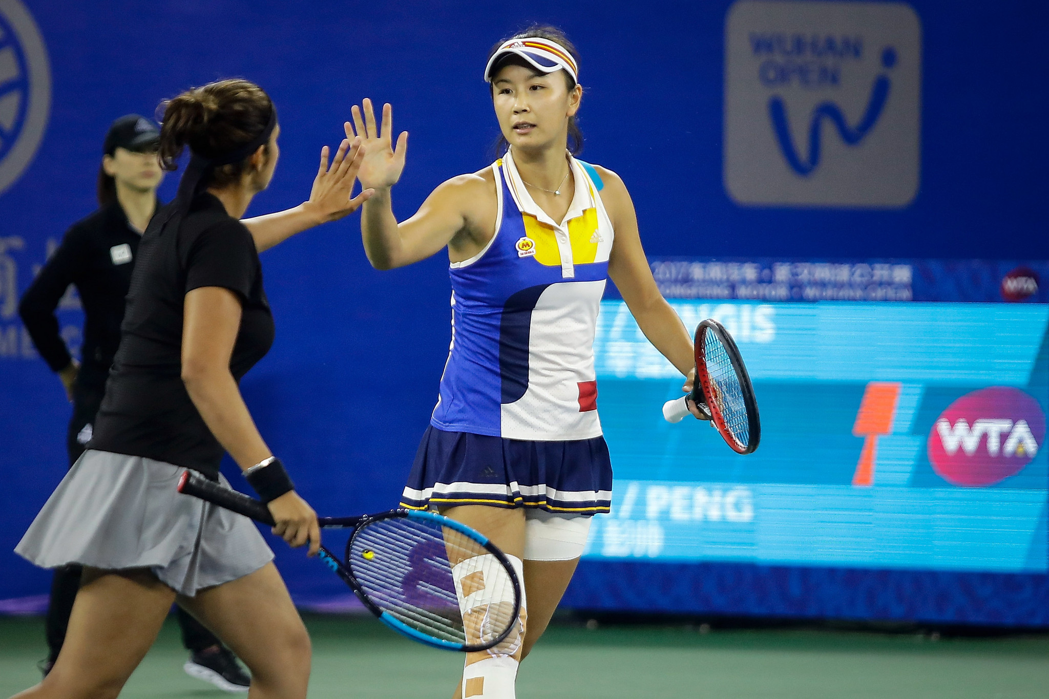 Peng Shuai, right, who is a three-time Olympian and former Wimbledon women's doubles champion, accused Zhang Gaoli of sexual assault ©Getty Images