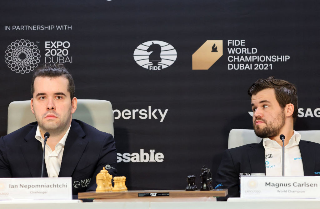 World chess champion Magnus Carlsen, right, and challenger Ian Nepomniachtchi pictured before their opening draw in the World Chess Championship in Dubai ©Getty Images