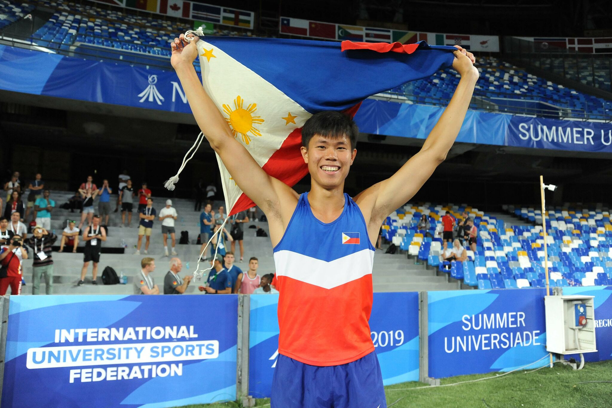 Ernest Obiena celebrates winning the pole vault at the 2019 Summer Universiade Games in Naples - the second gold medal won by the Philippines ©FISU 