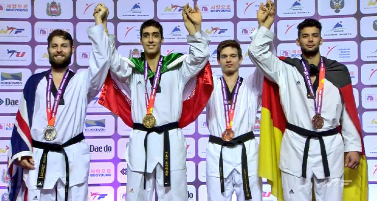 Iran's Mahdi Khodabakhshi (second left) is one fighter who triumphed using a style that was brutally effective, but defensive and solid rather than spectacular ©WTF