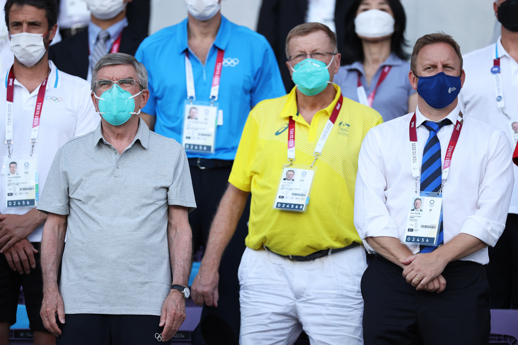 IOC President Thomas Bach and IOC vice-president John Coates watch the rugby sevens action alongside World Rugby chief executive Alan Gilpin at Tokyo 2020 ©Getty Images
