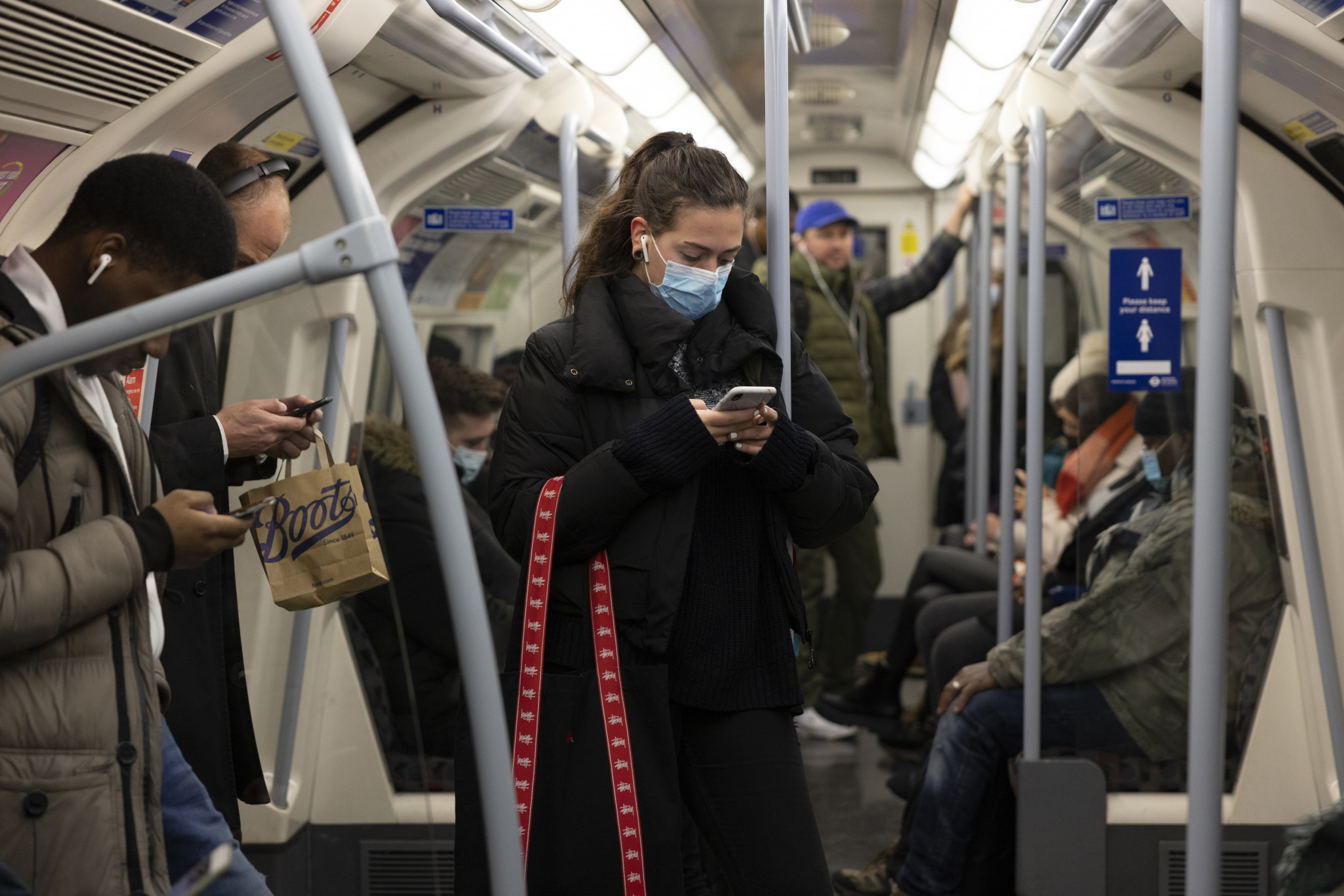 Masks have been made compulsory on public transport in England as part of efforts to reduce the spread of the new COVID-19 variant ©Getty Images