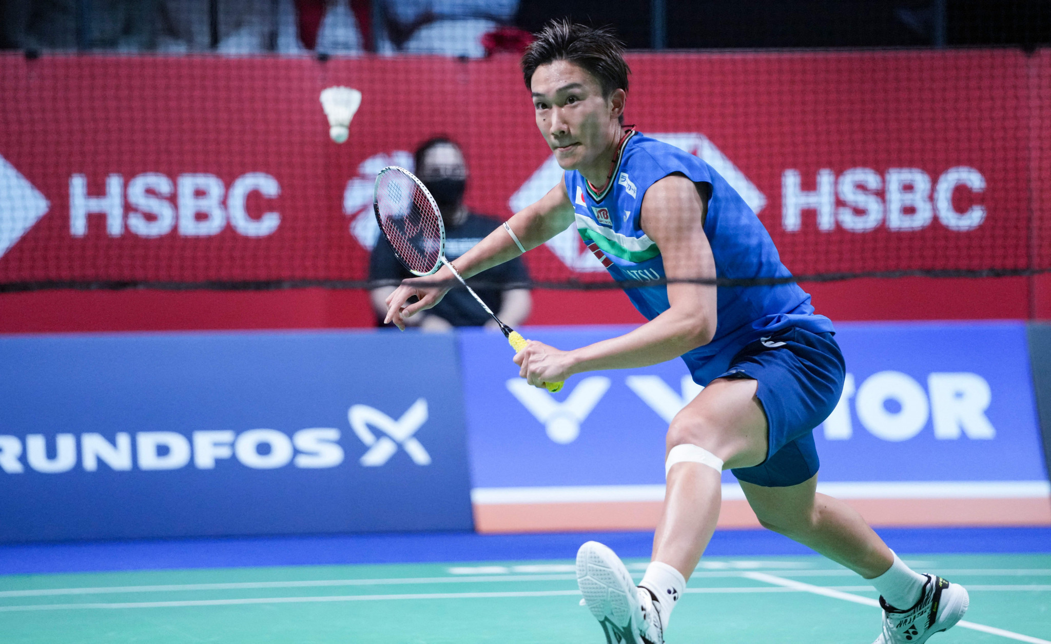 Japan's Kenta Momota retired injured after two points of his men's singles match at the BWF World Tour Finals in Bali ©Getty Images