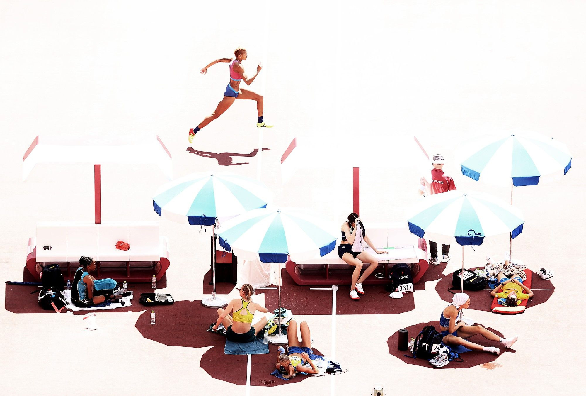 This study of women's high jump qualifying on a baking morning at the Tokyo Olympics won Ryan Pierse the Jean-PIerre Durand World Athletics Photograph of the Year award  ©World Athletics
