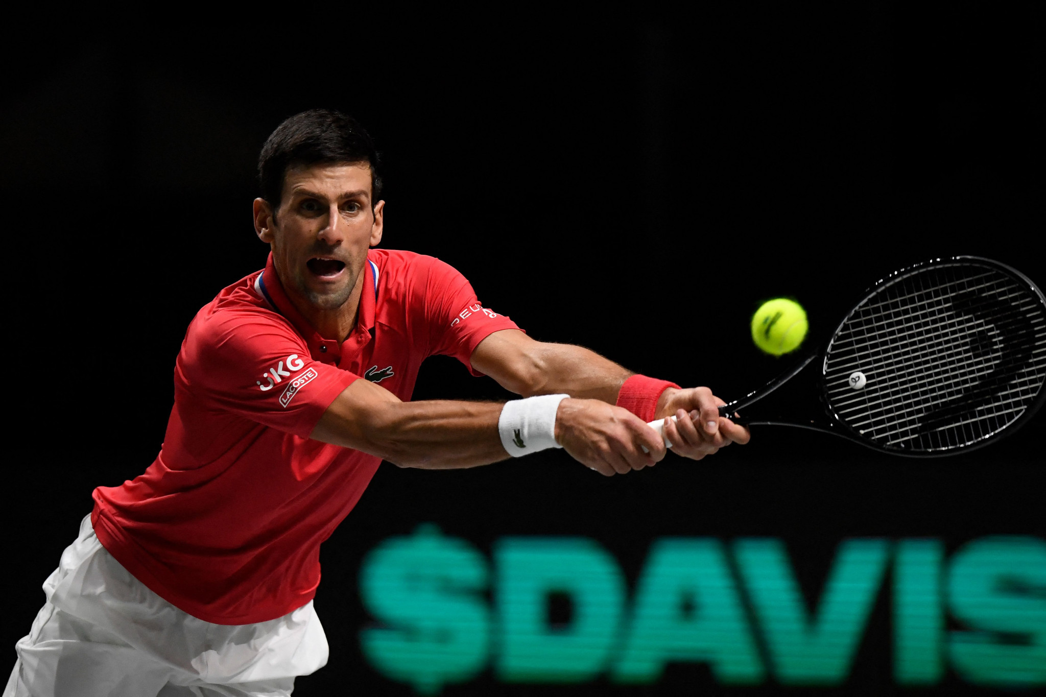 Djokovic blasts Serbia into Davis Cup semi-finals