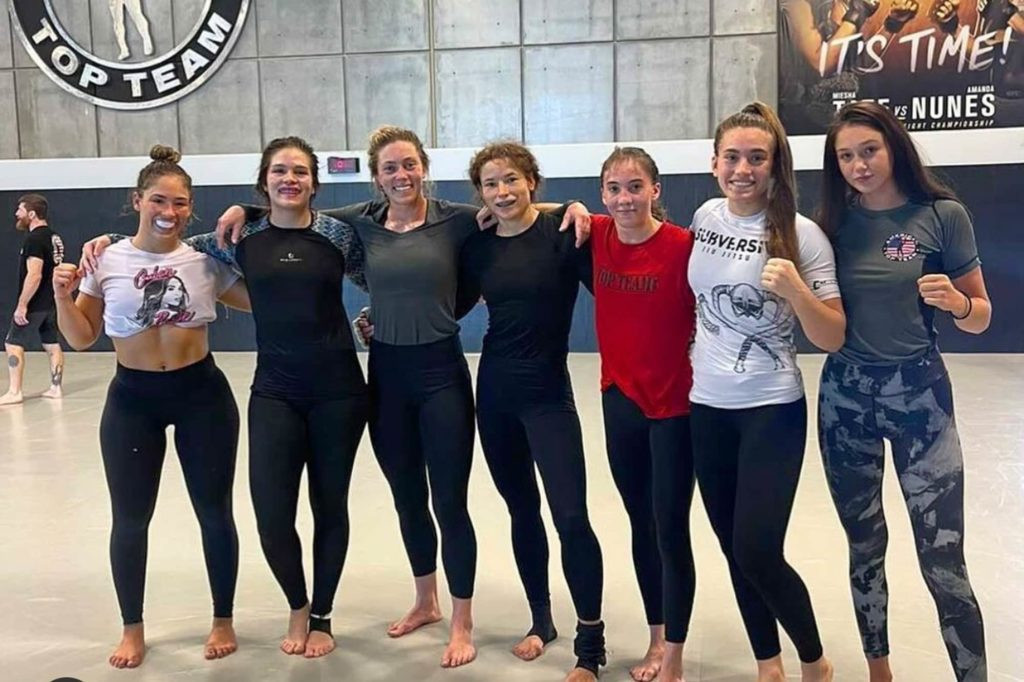 Michelle Montague, third left, has thanked the IMMAF for its support amid COVID-19 challenges ©Instagram/thewildonemma