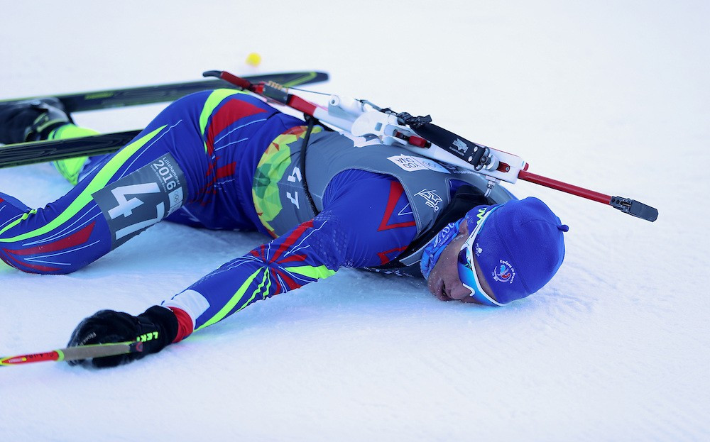 Emilien Claude of France was exhausted after taking gold in the men's 7.5km biathlon event ©YIS/IOC