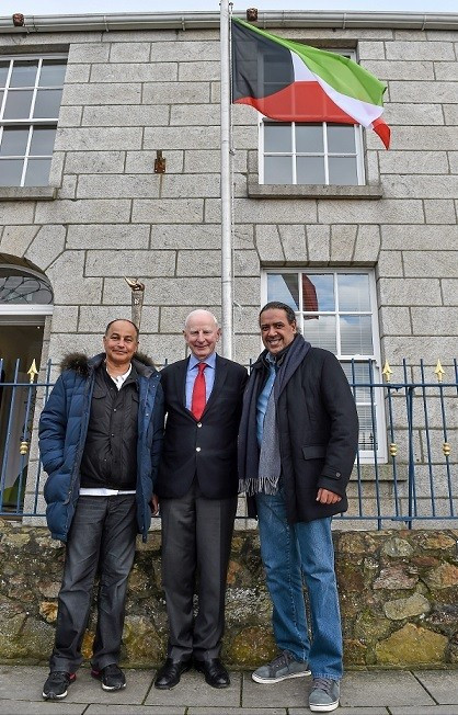The flag of Kuwait, the home country of Sheikh Ahmad, right, was raised before his meeting with Pat Hickey, centre ©ANOC 