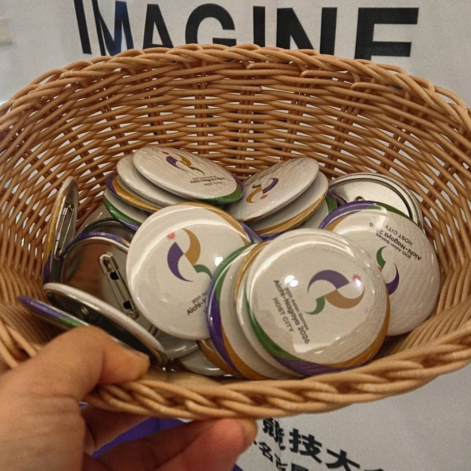 Badges distributed to promote Aichi-Nagoya 2026 Asian Games