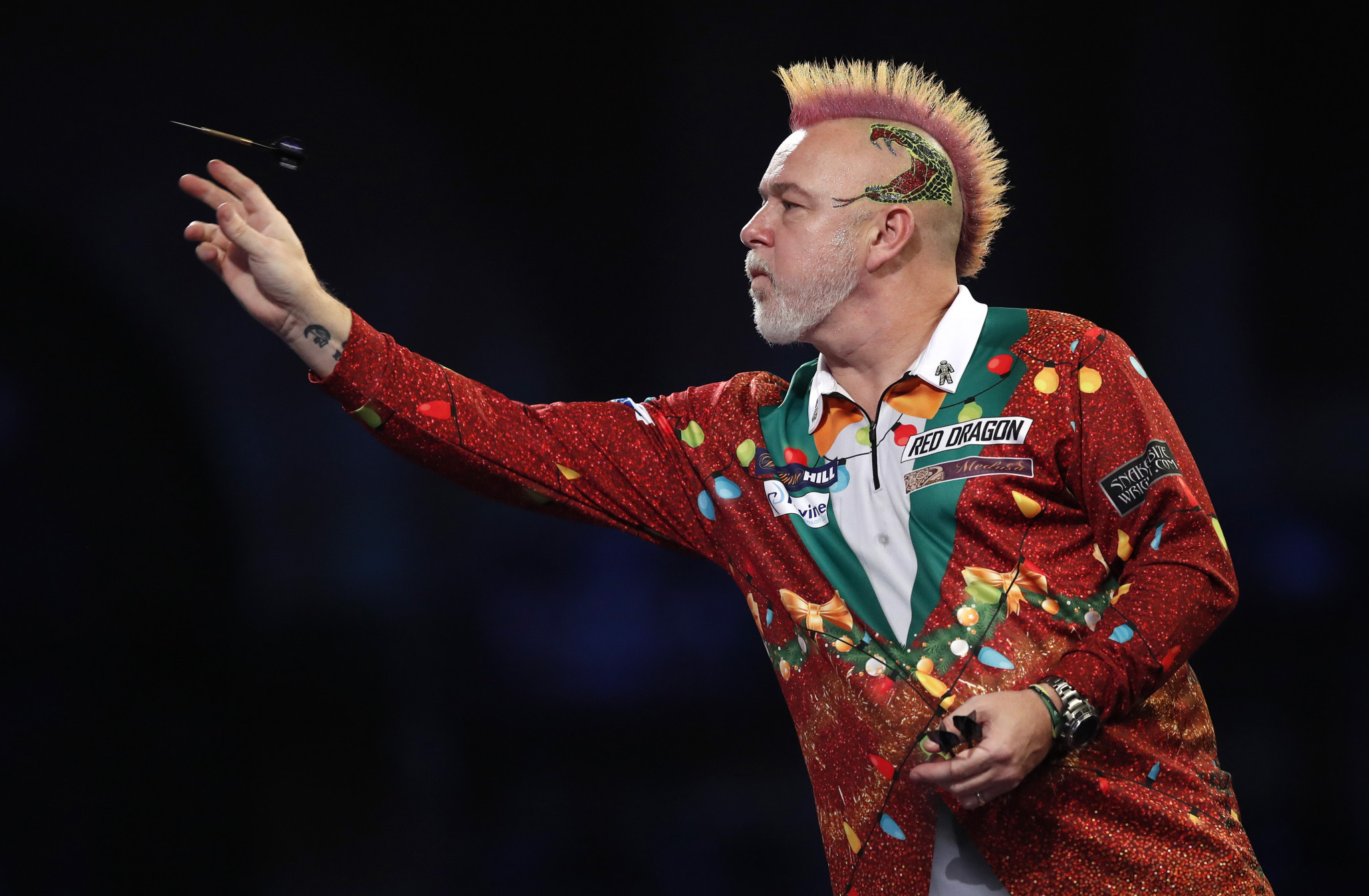 2020 PDC world champion Peter Wright safely reached round three of the PDC World Championship with a 3-0 victory ©Getty Images
