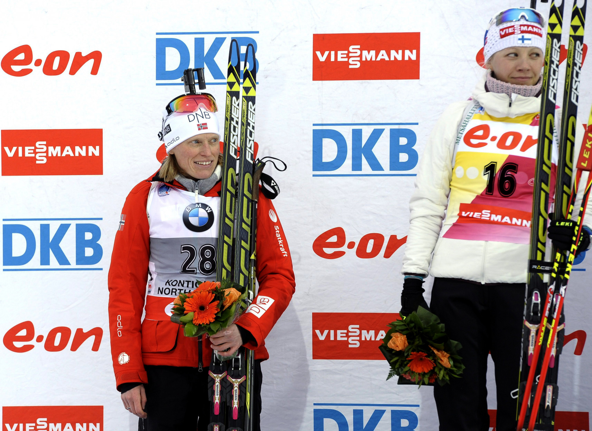 Norway's Tora Berger, left, now has more points in the 2013-2014 Biathlon World Cup season than crystal globe winner Kaisa Mäkäräinen of Finland, right ©Getty Images