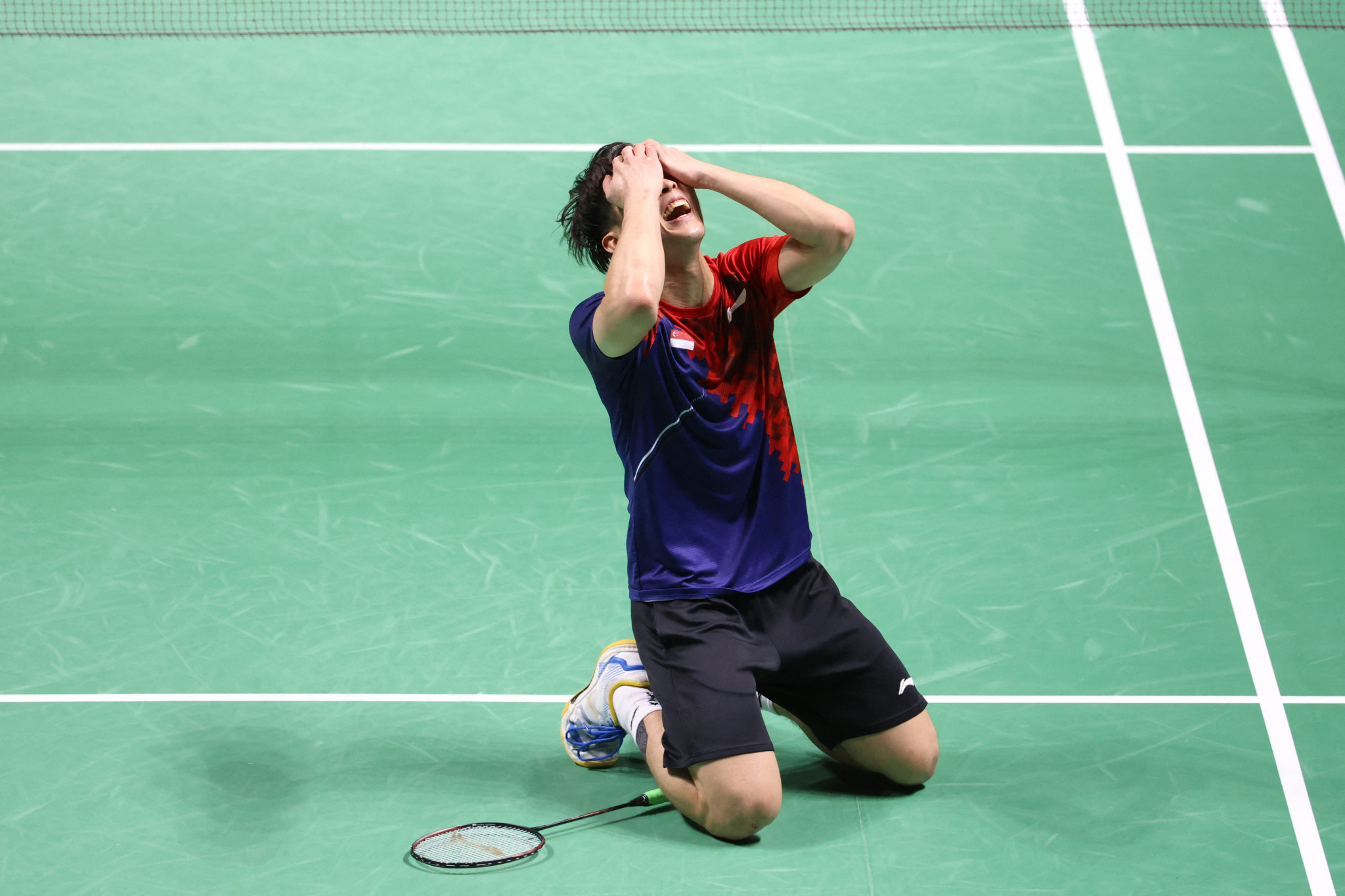 Loh becomes first Singapore player to win Badminton World Championships title