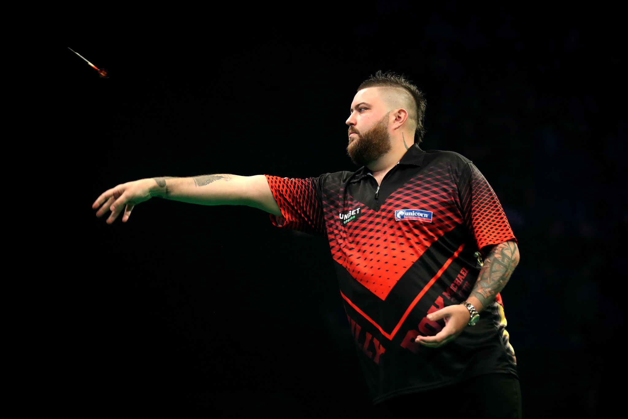 Michael Smith produced the highest average of the tournament so far in his easy second-round win ©Getty Images