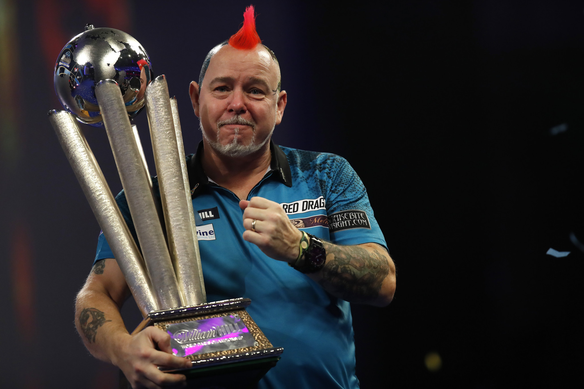 An emotional Peter Wright celebrated winning his second world title ©Getty Images