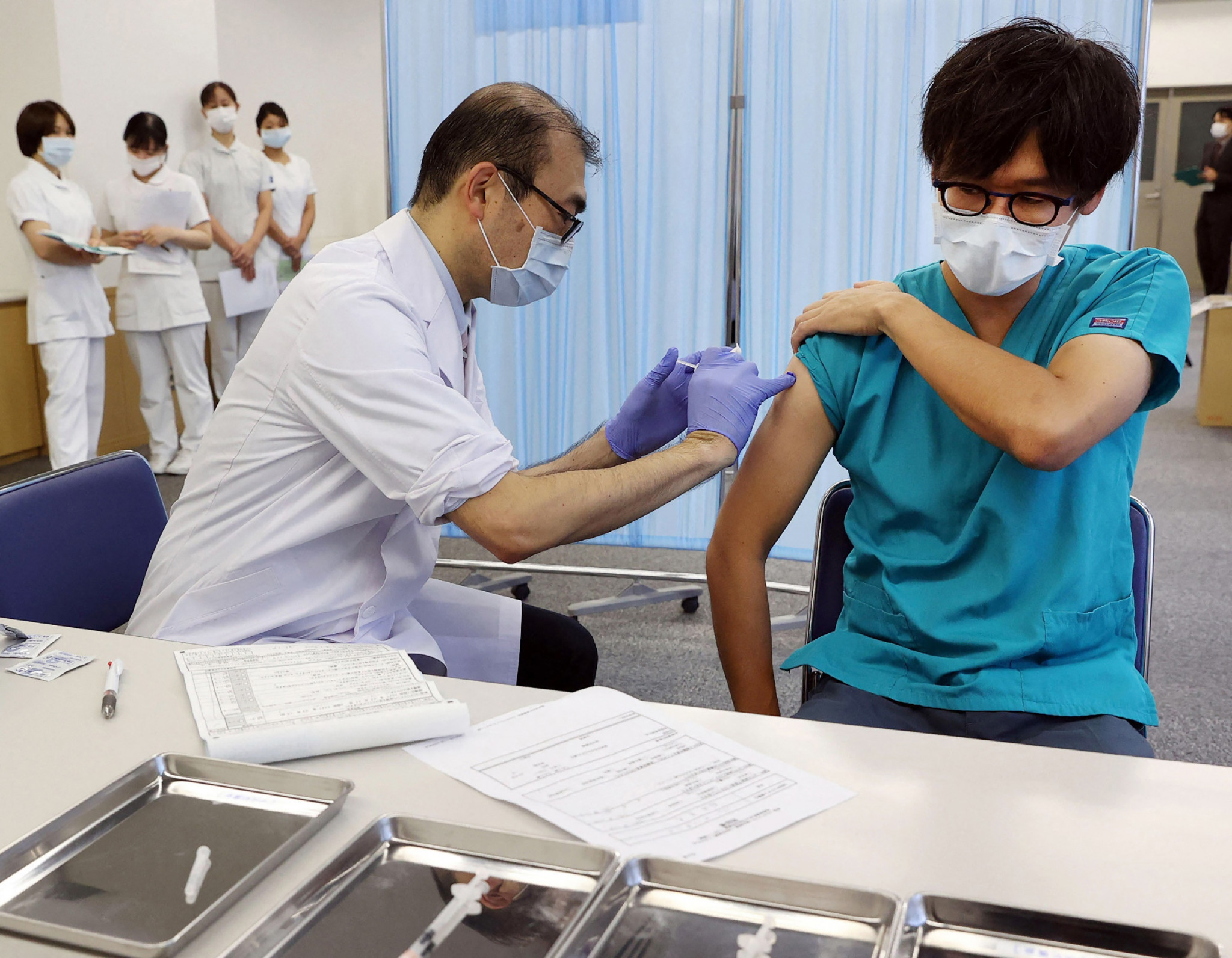 Japan has been giving health care workers COVID-19 booster shots since last month ©Getty Images