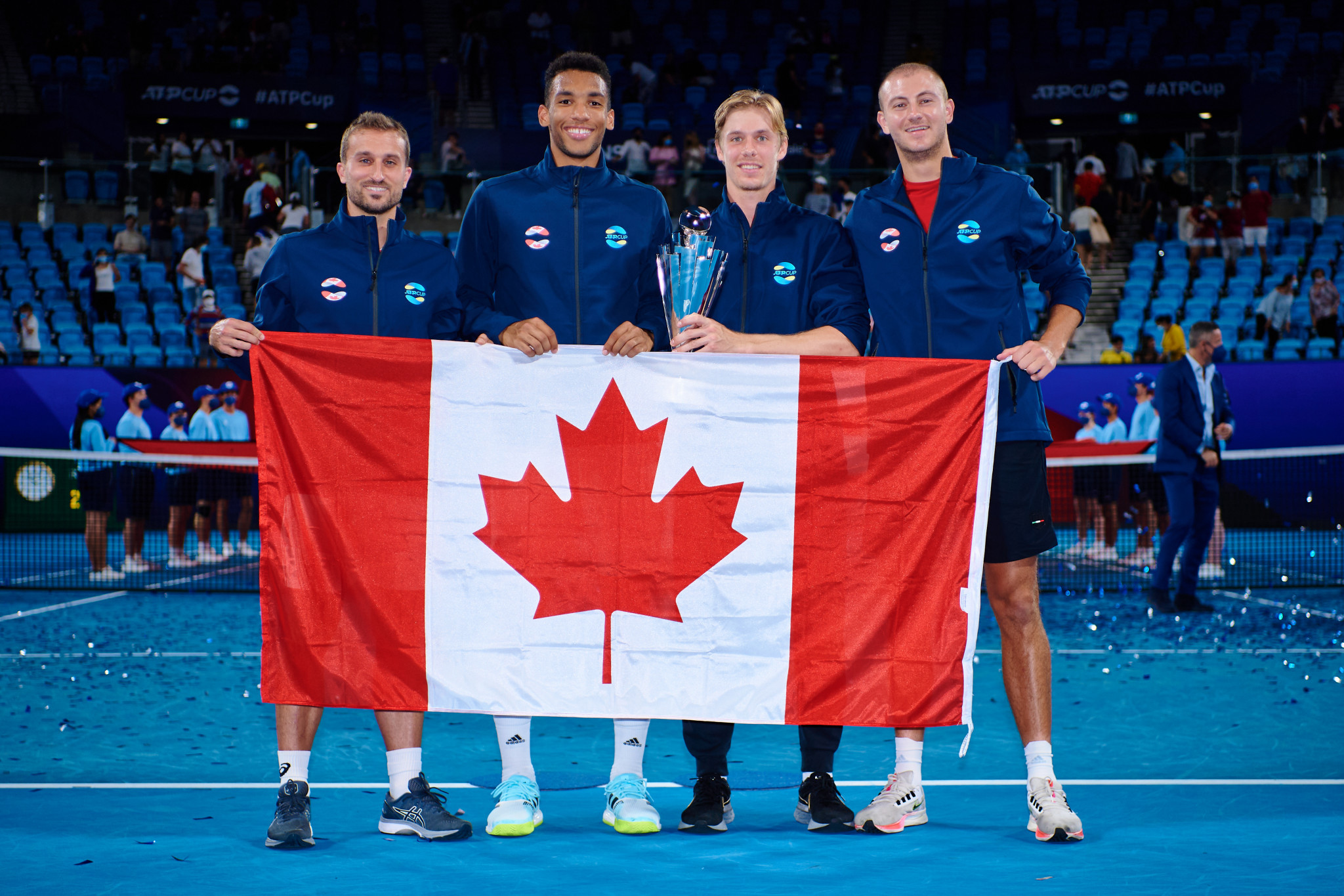 Félix Auger-Aliassime, second left, beat Spain's Roberto Bautista Agut in straight sets to clinch the ATP Cup for Canada ©Getty Images