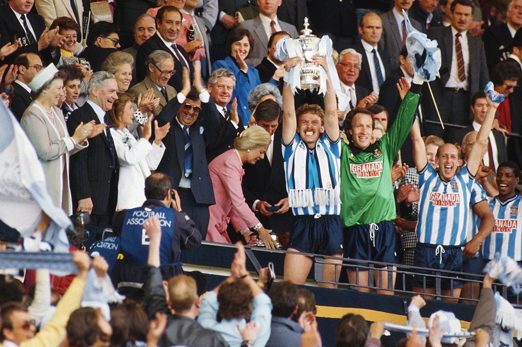 And in the end, the coloured ribbons were white and light blue as Coventry City's captain Brian Kilcline lifted the FA Cup after receiving it from the Duchess of Kent in 1987 ©Getty Images