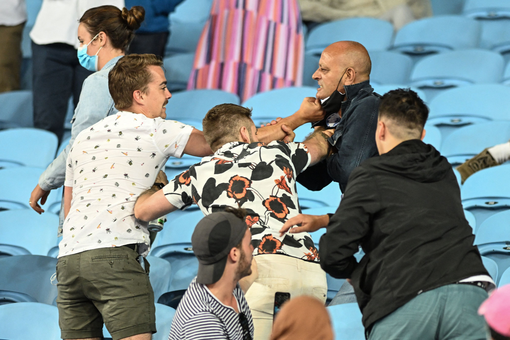 Anti-mask spectator ejected from Australian Open as fight ensues in another match
