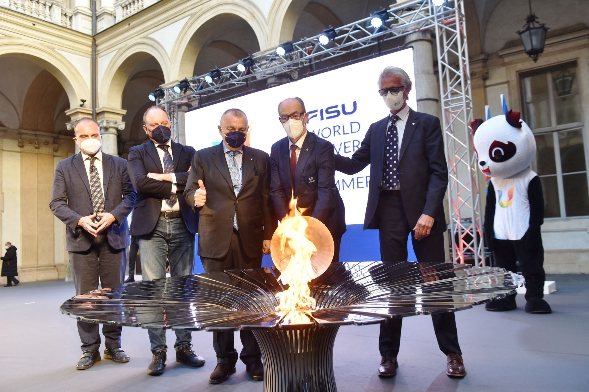 Leonz Eder, second from right, lit the FISU Flame which is now on its way to Chengdu ©FISU