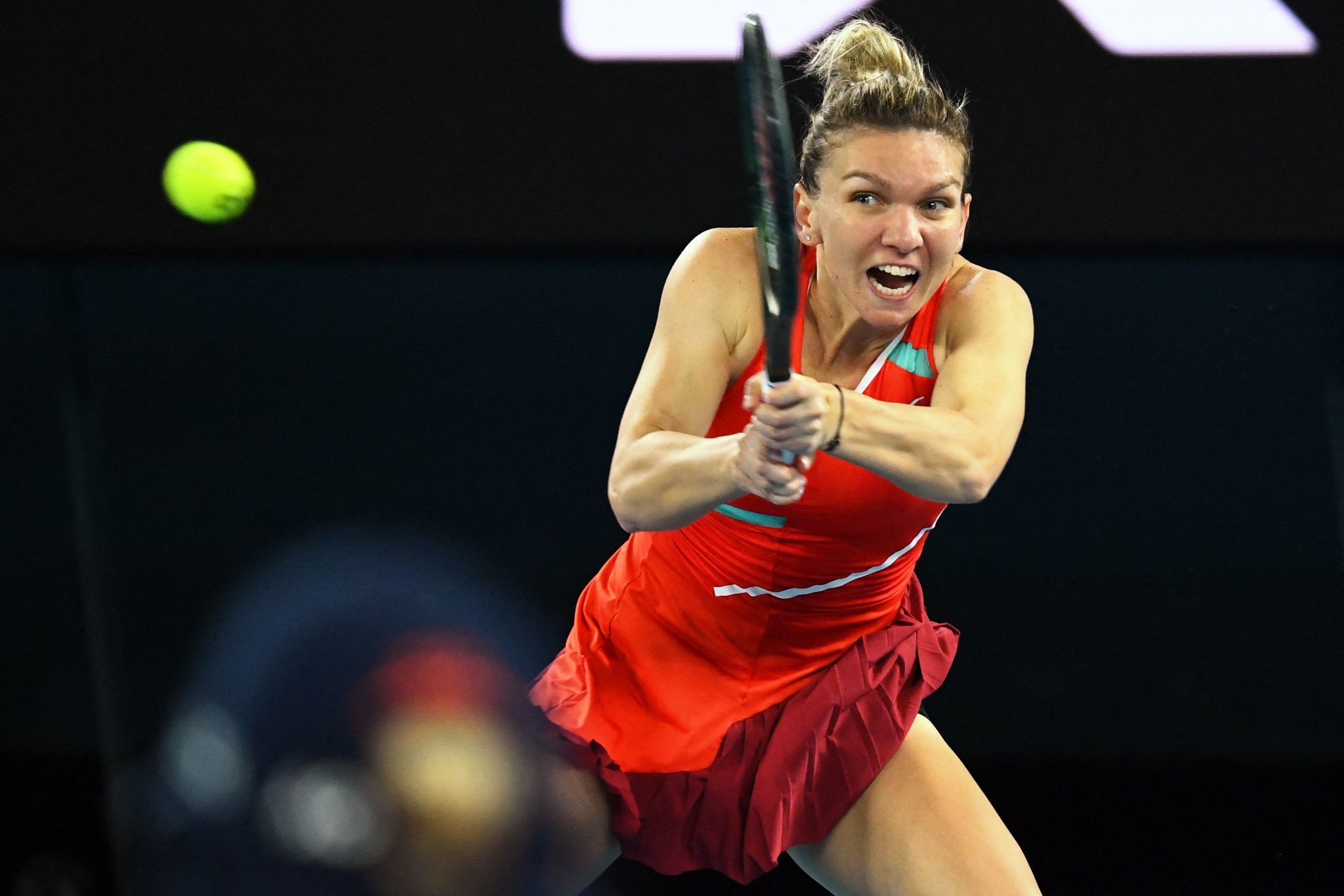 Romania's Simona Halep thumps a backhand on her way to an emphatic victory over Brazilian Beatriz Haddad Maia ©Getty Images