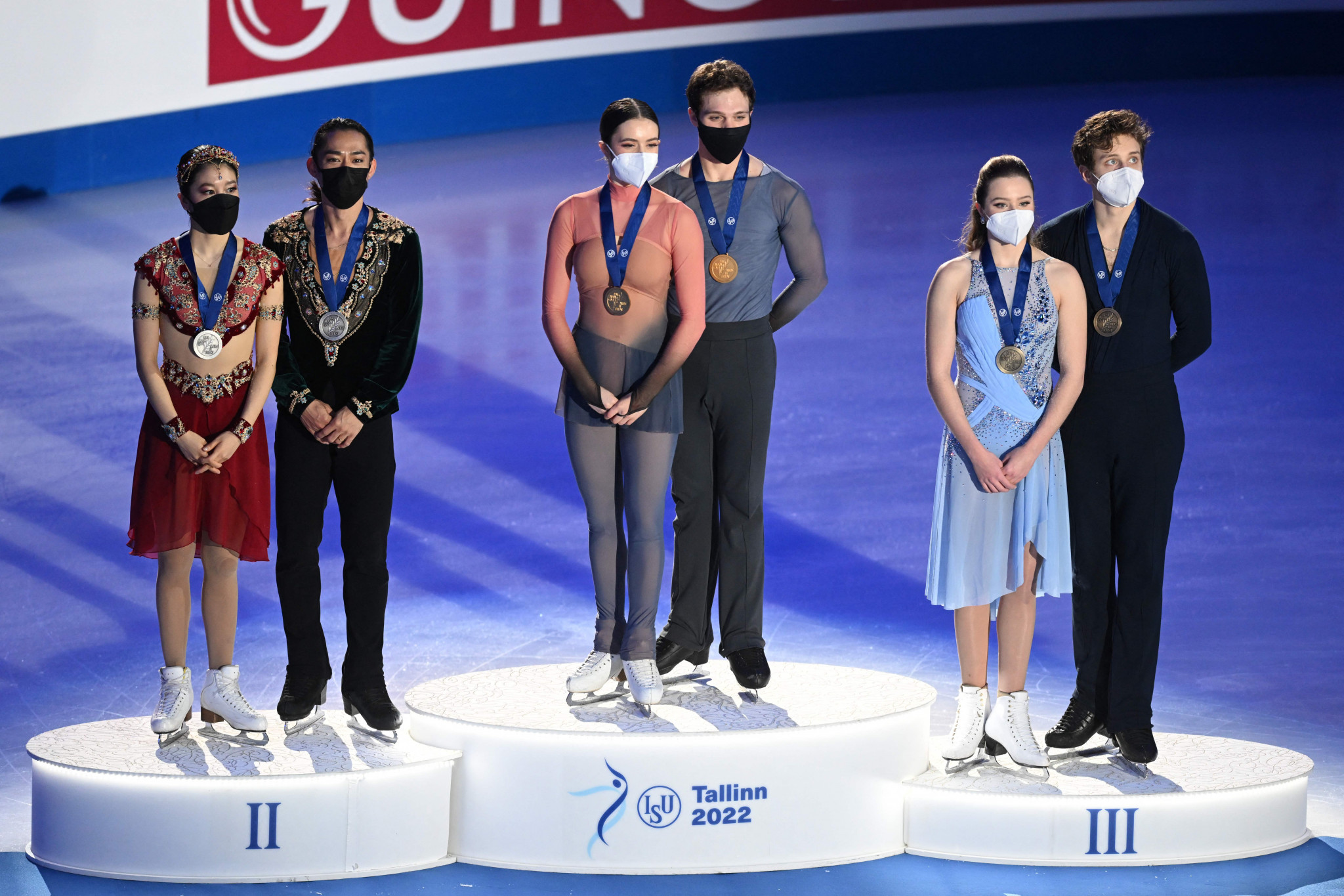 The podium for the ice dance free dance event at the ISU Four Continents Figure Skating Championships, with winners Caroline Green and Michael Parsons, pictured centre ©Getty Images