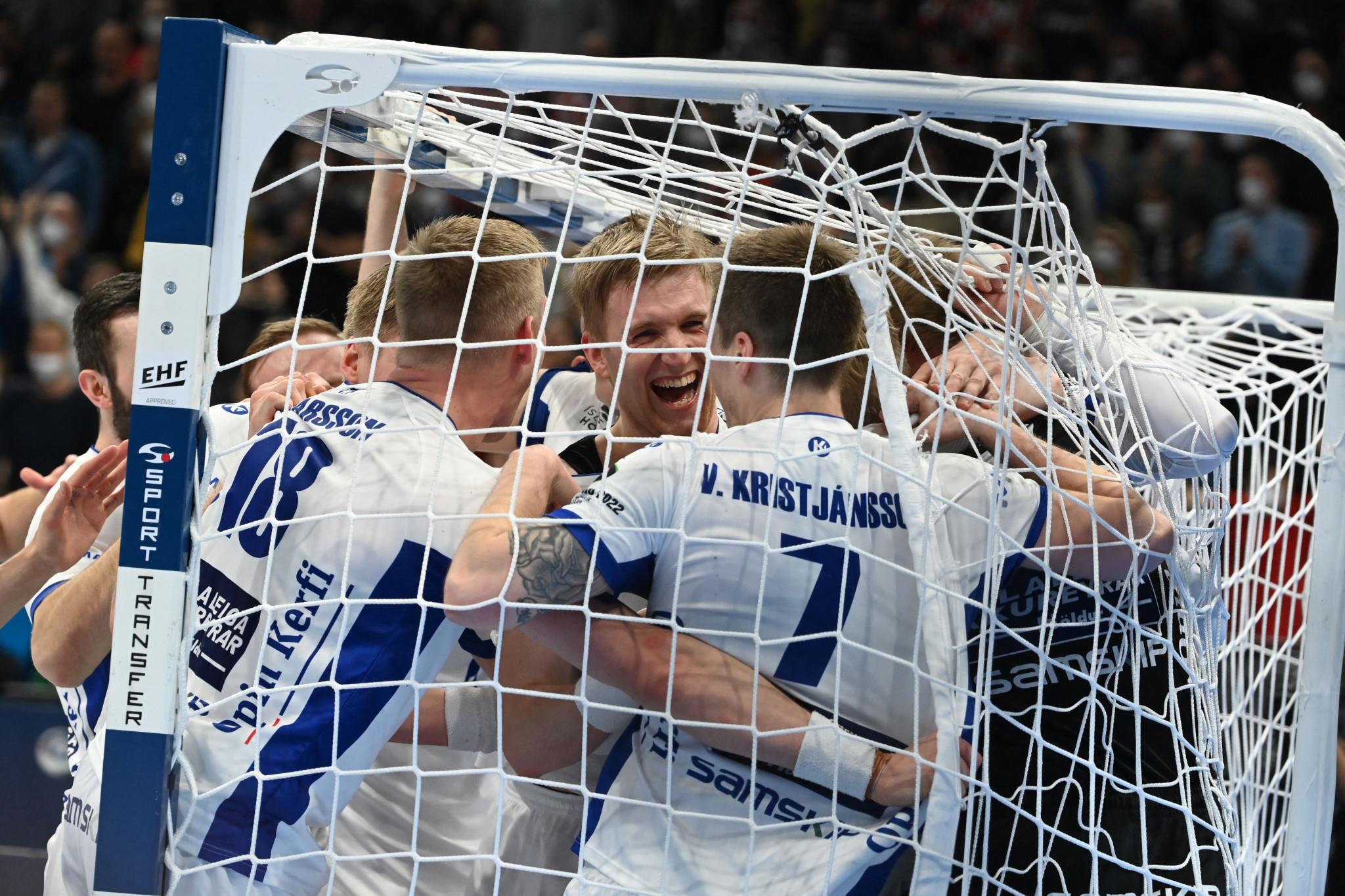 Iceland's players celebrate after defeating France at the men's European Handball Championship, their first win over the current Olympic champions since London 2012 ©Getty Images