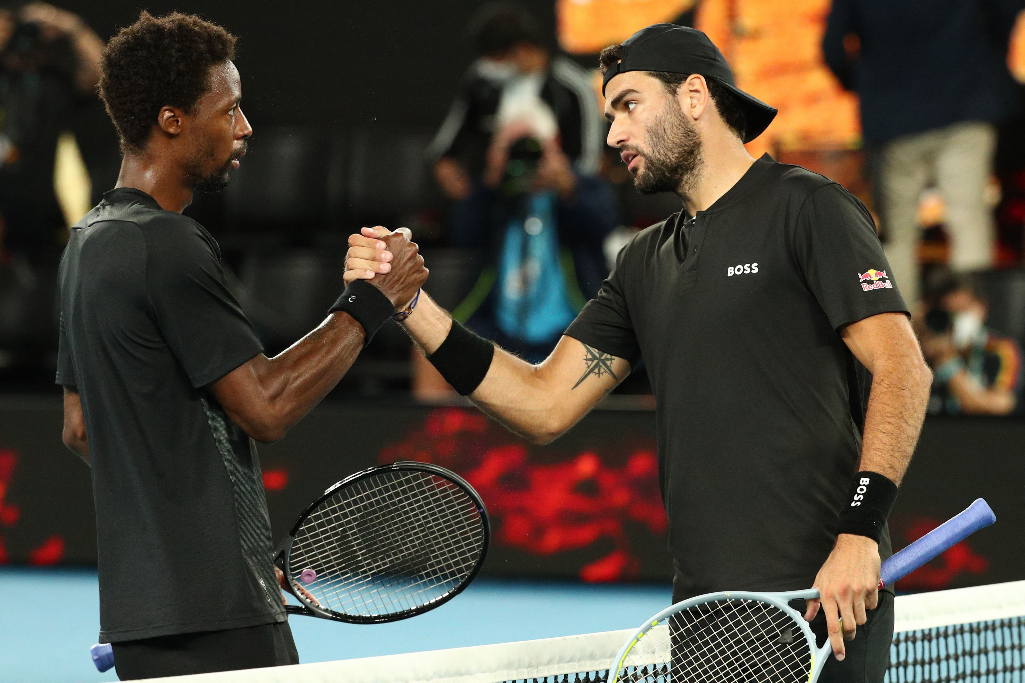 Matteo Berrettini, right, overcame Frenchman Gael Monfils to become the first Italian man to reach the Australian Open semi-finals ©Getty Images