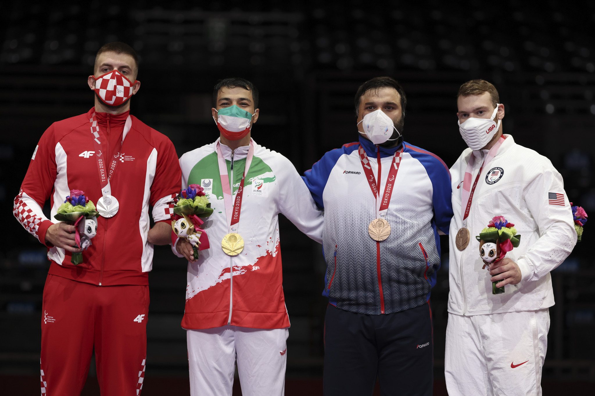 Evan Meddell, first on the right, won bronze at Tokyo 2020, to give Team USA their first Para taekwondo medal ©Getty Images