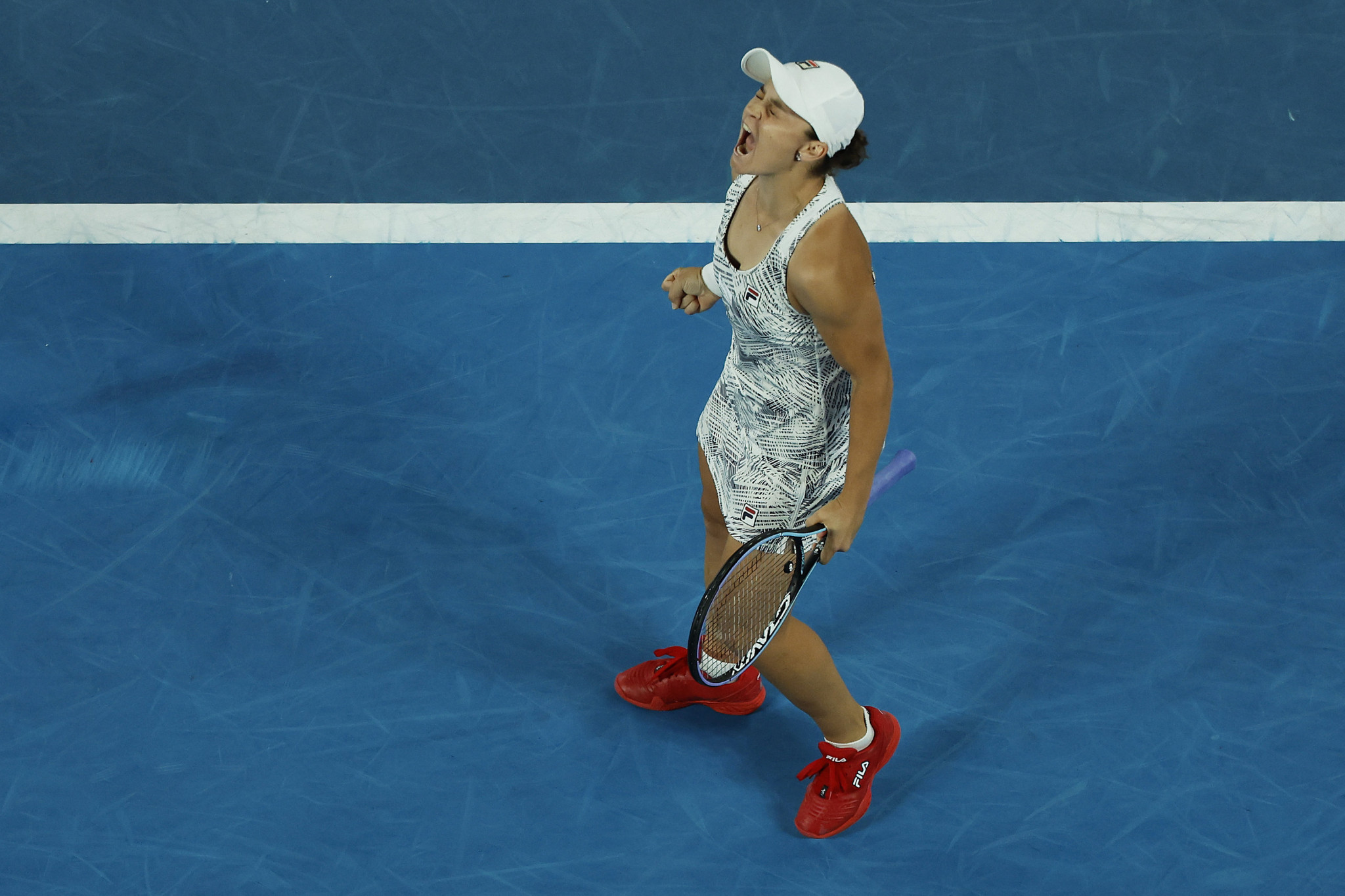 Ashleigh Barty roars in delight after winning the Australian Open women's singles title in Melbourne ©Getty Images