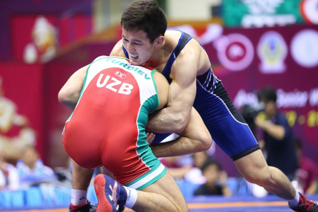 Kazakhstan's Doszhan Kartikov continued his comeback from injury by winning 75kg gold