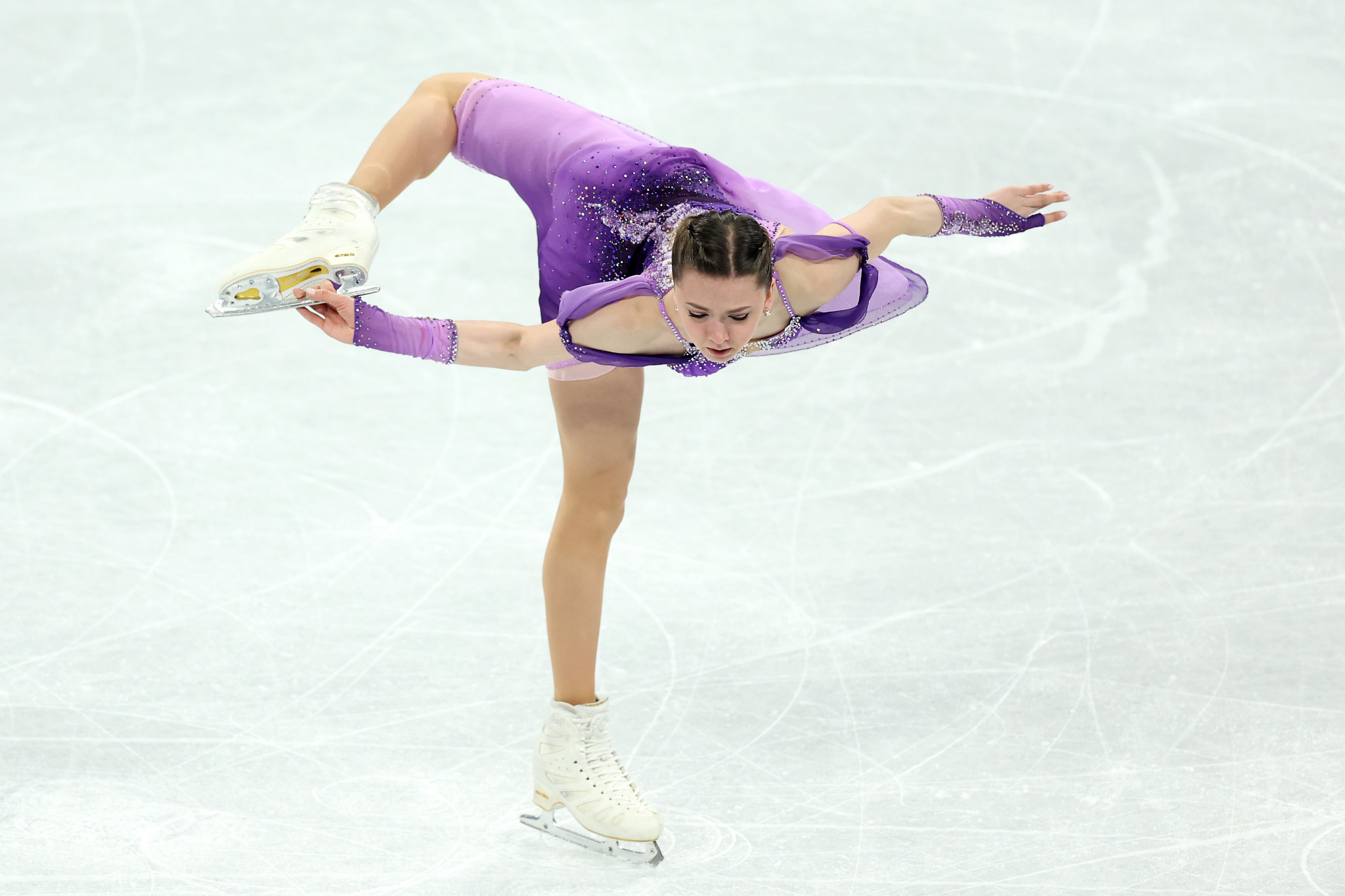 Fifteen-year-old Kamila Valieva dazzled with the best score in the women's short programme segment of the team figure skating event, helping the ROC top the standings with a day to go ©Getty Images